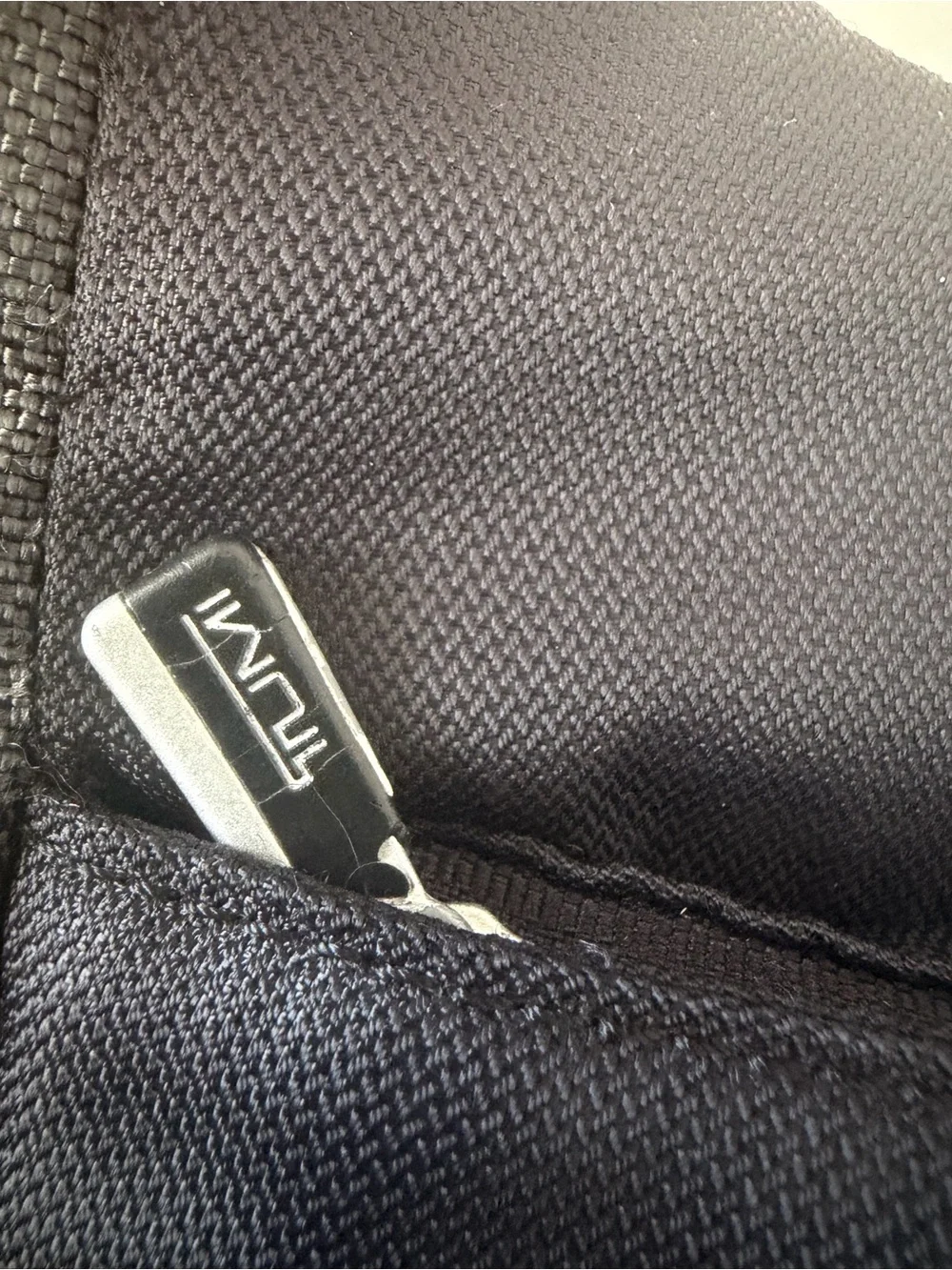 Tumi compact messenger