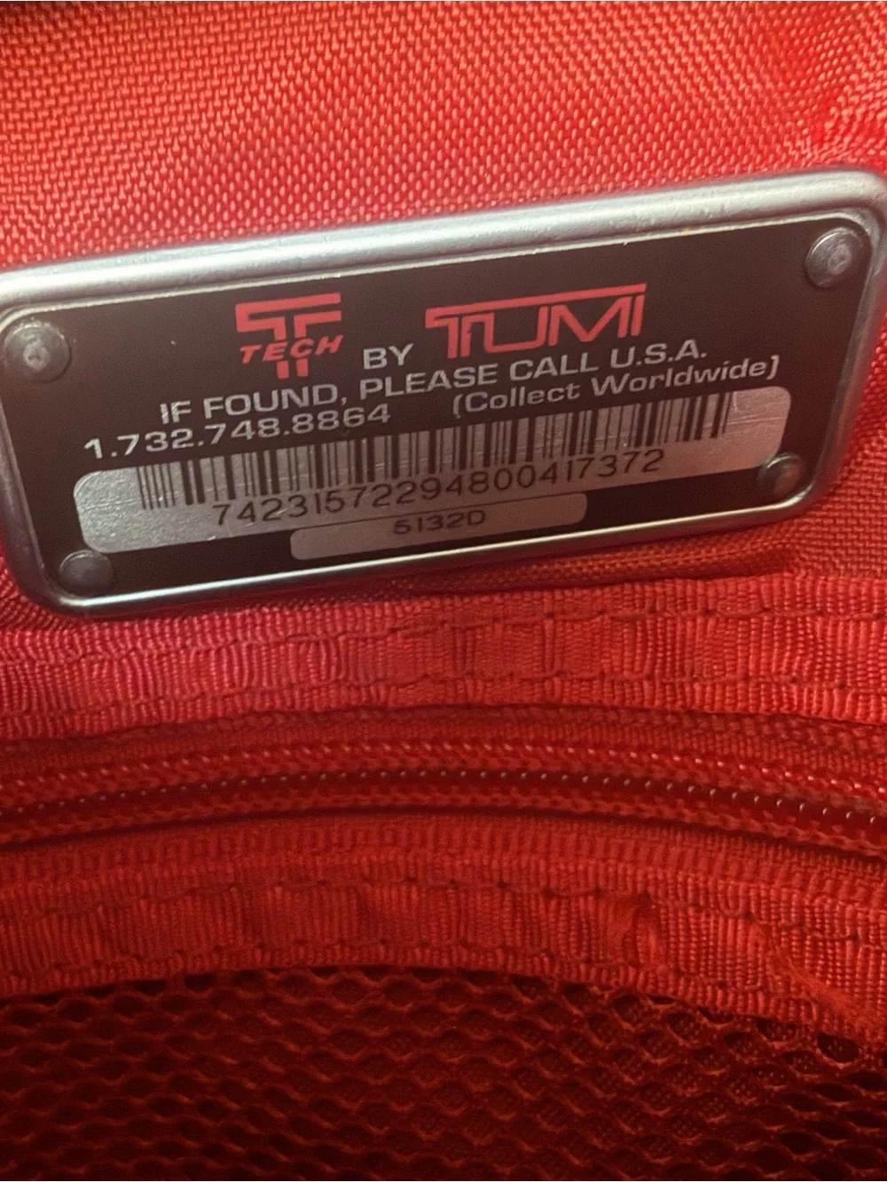 Tumi compact messenger