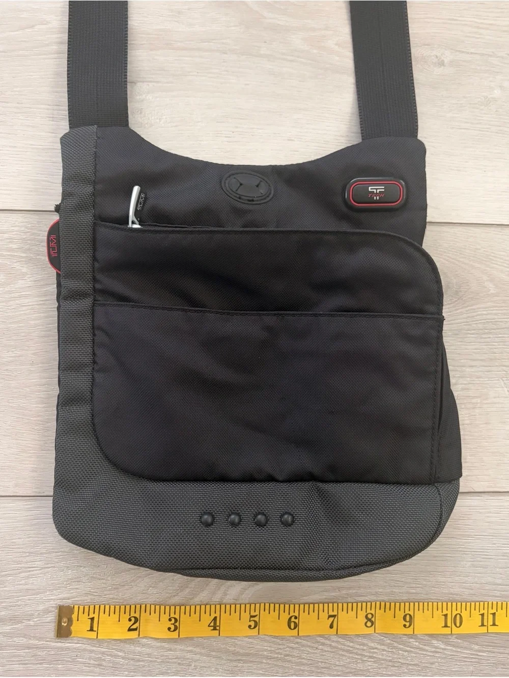 Tumi compact messenger