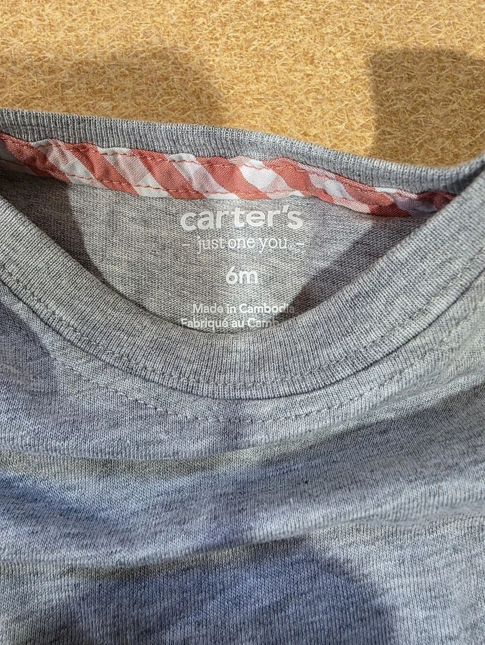 Carters tag missing torn