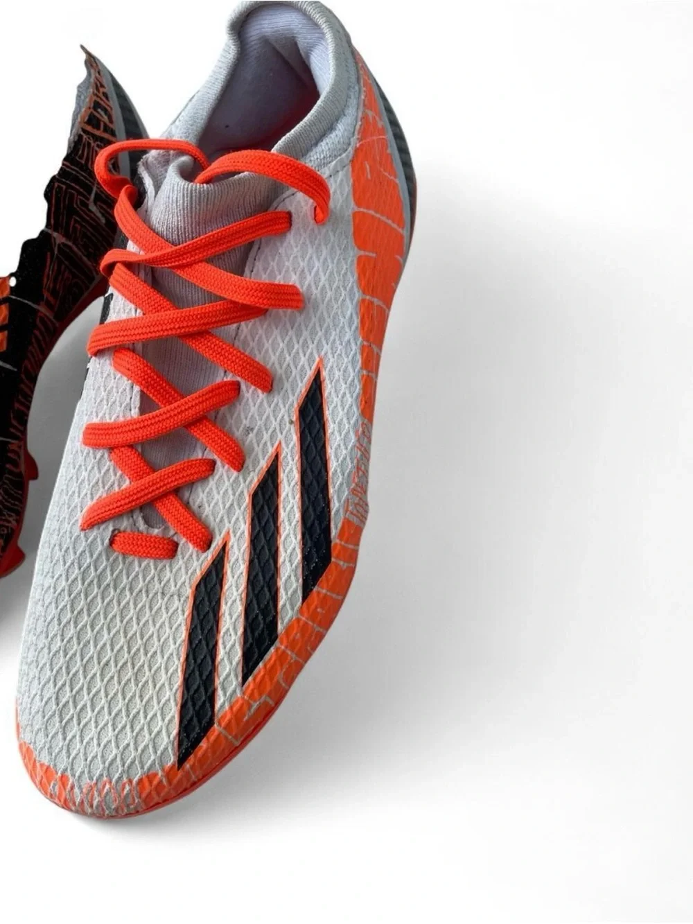 adidas Gray and Orange Soccer Cleats with Black Stripes