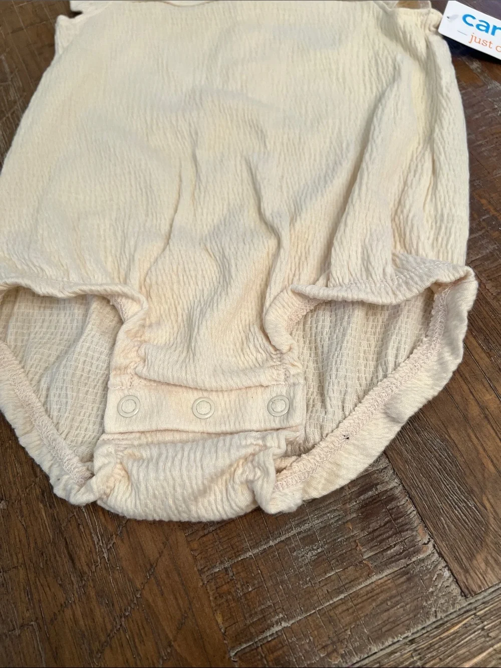 Carter's Cream Flutter Romper with Black Floral Stitching