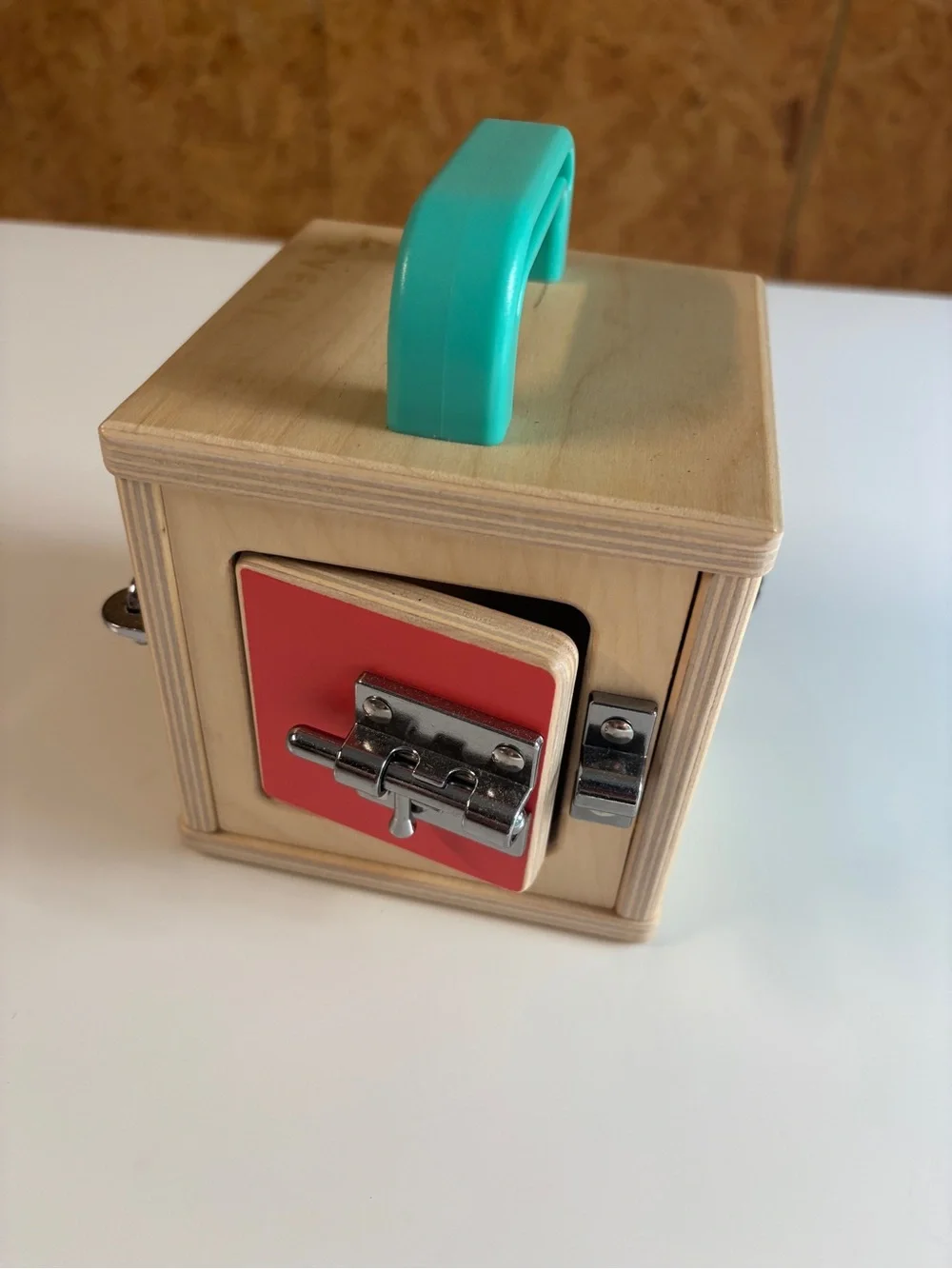 Wooden Lock Box Toy with Turquoise Handle and Red Door