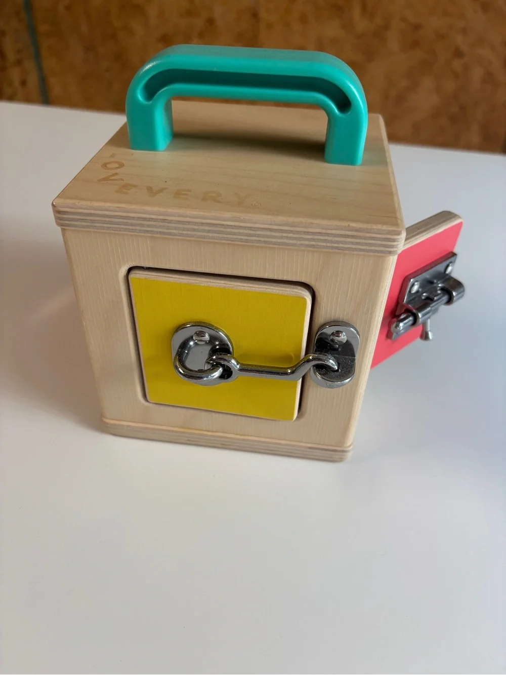 Wooden Lock Box Toy with Turquoise Handle and Red Door