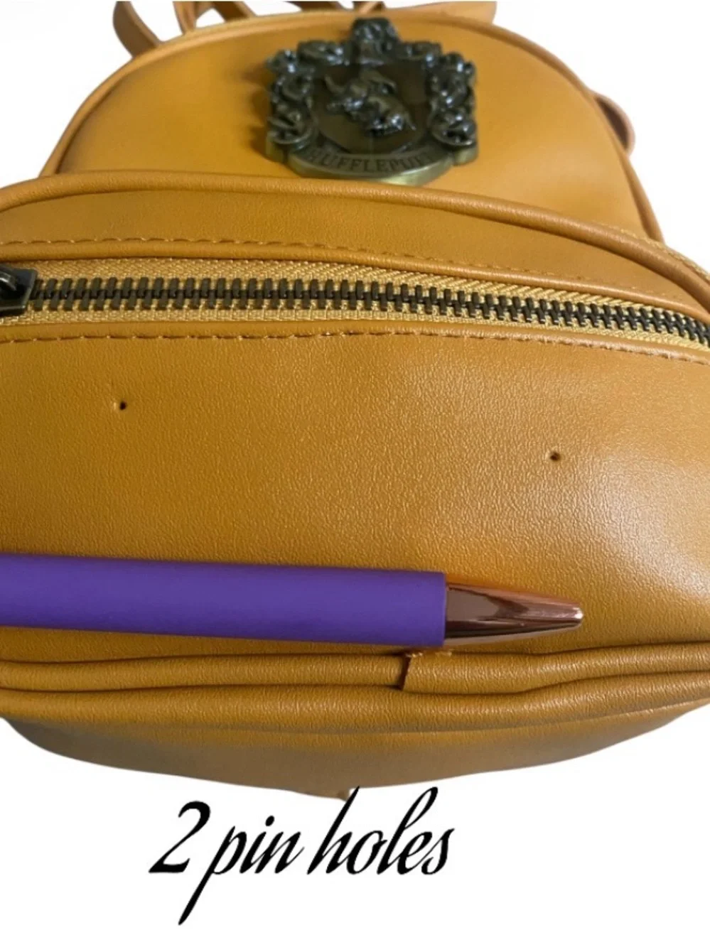 Universal studios wizarding world harry potter Hufflepuff crest mini backpack