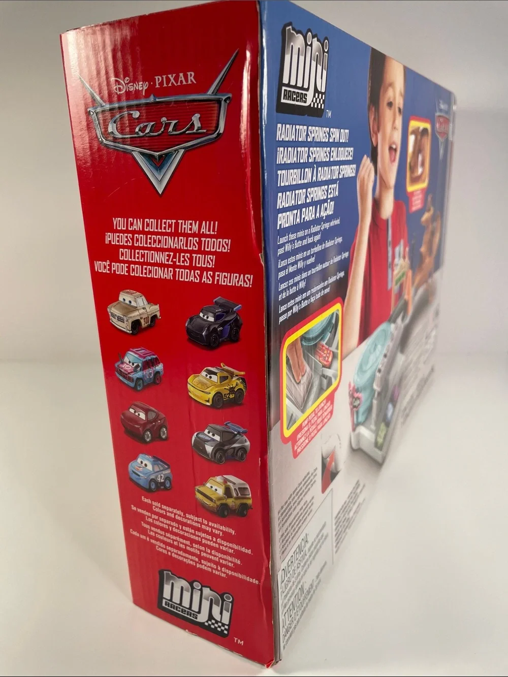 Mini Racers-Cardboard Packaging has dents and a torn spot as shown