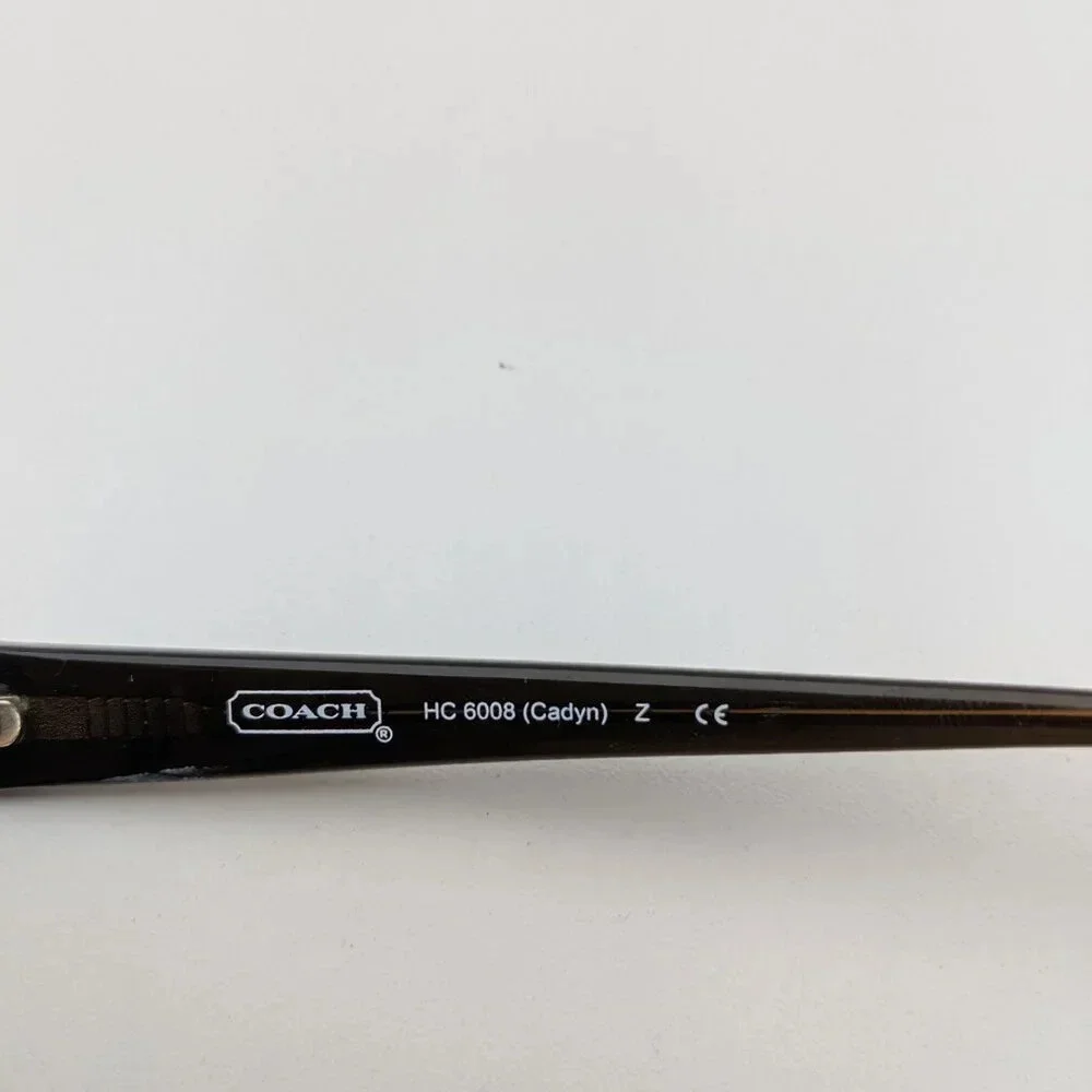 Coach scratches excellent brown