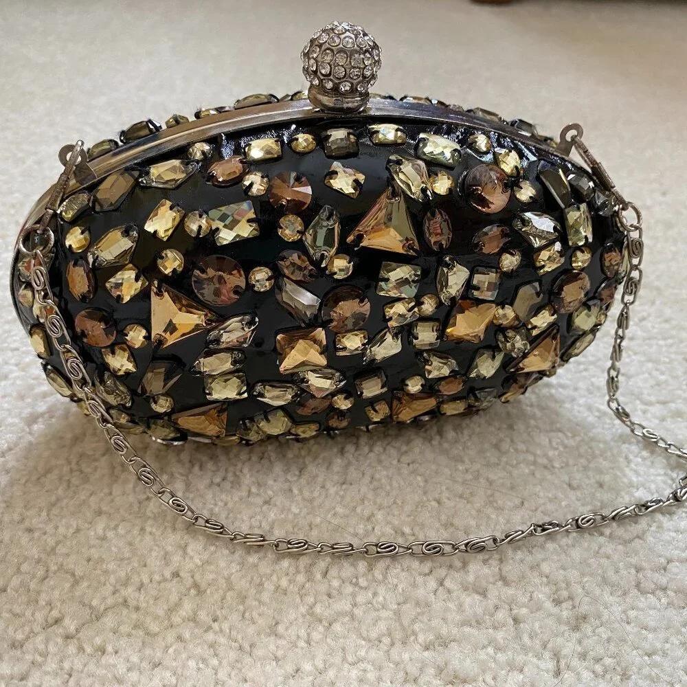 NWOT, bejeweled clamshell purse, chain strap, rhinestone clasp.
