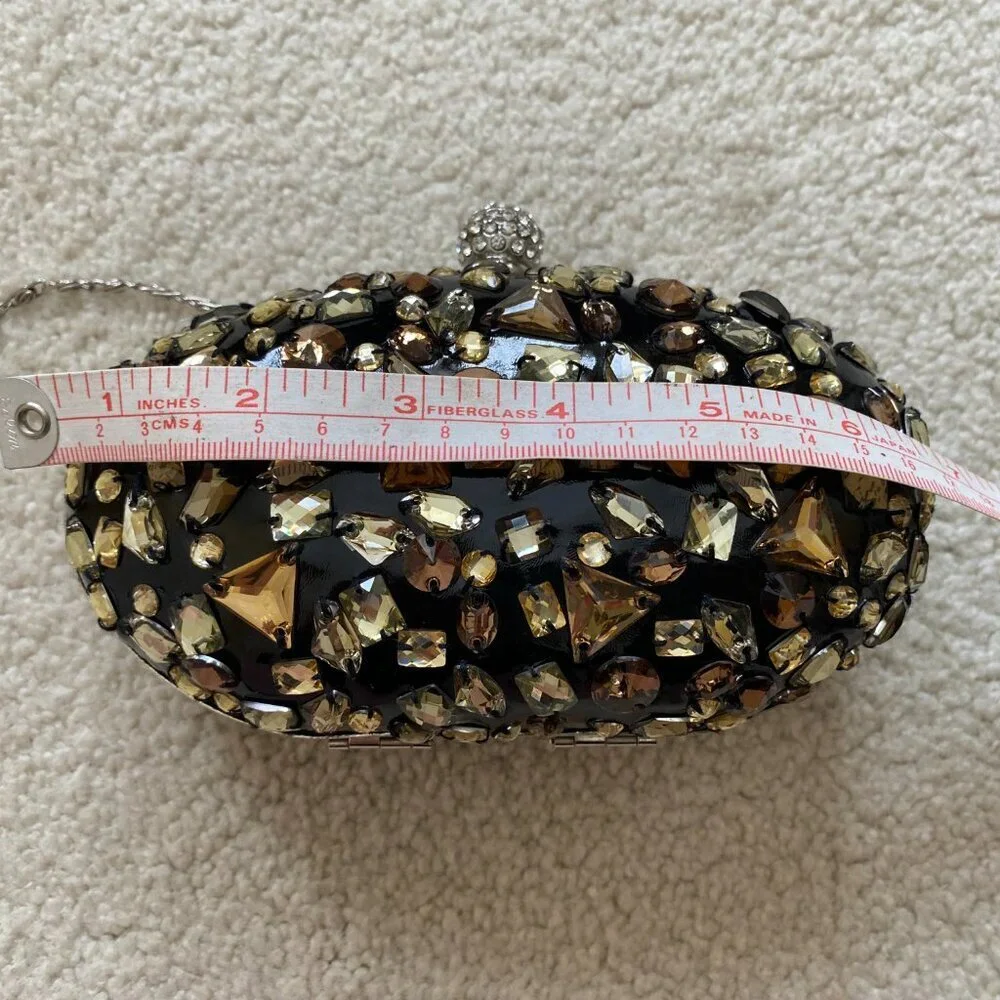 NWOT, bejeweled clamshell purse, chain strap, rhinestone clasp.