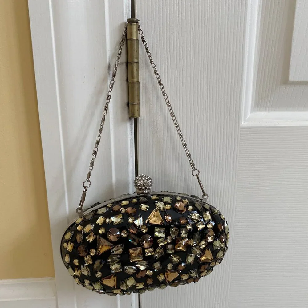 NWOT, bejeweled clamshell purse, chain strap, rhinestone clasp.