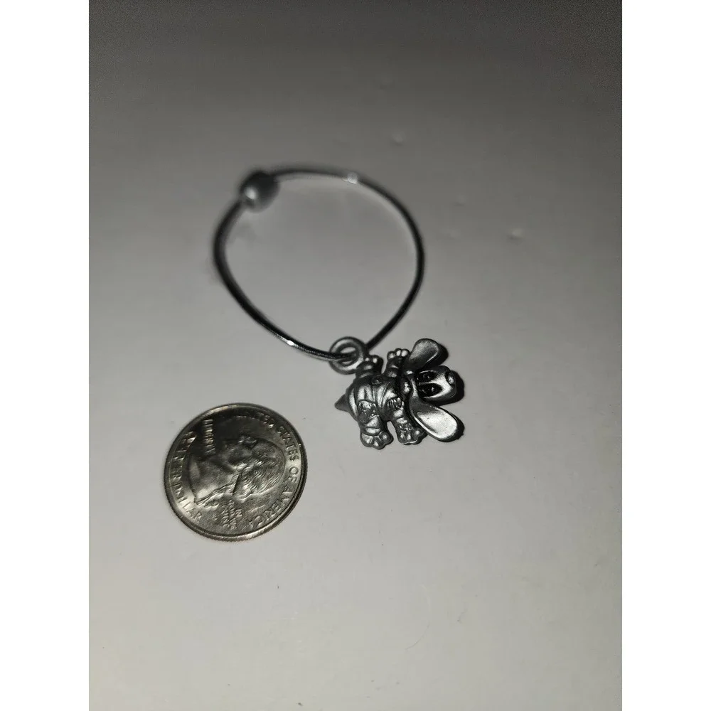 Vintage Plastic Pound‎ Puppies Charm