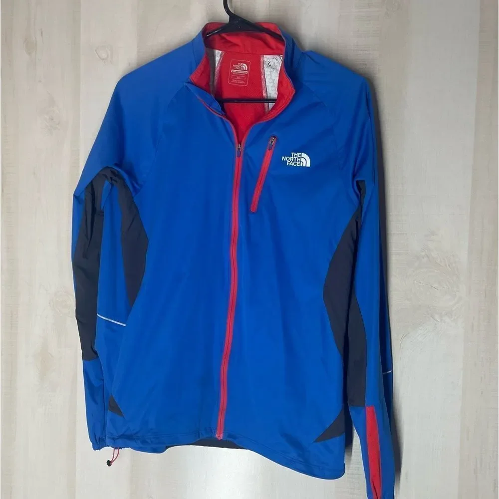 The North Face flight series blue black red jacket, size small‎