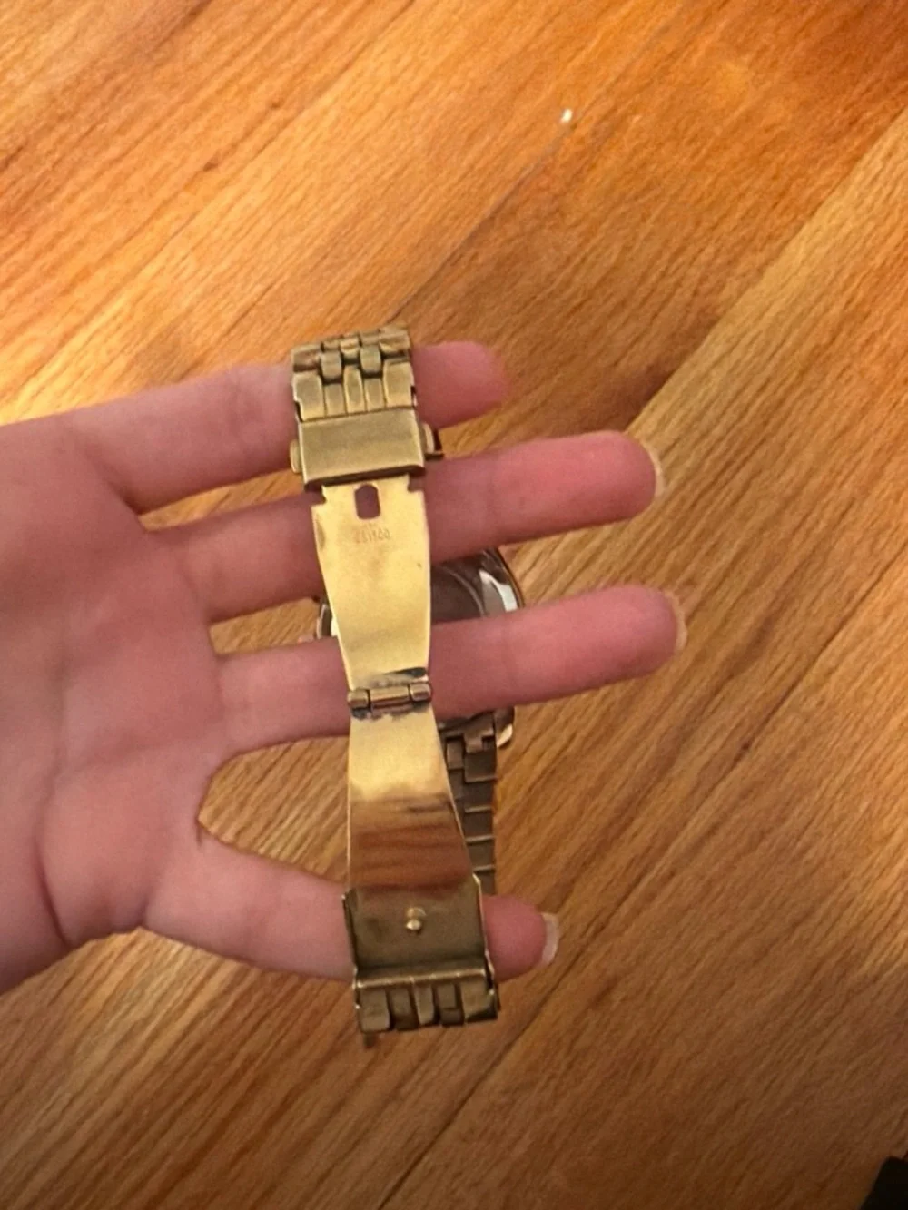 Michael Kors gold tone
