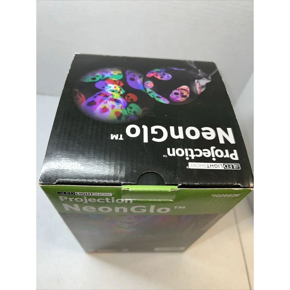 Gemmy Halloween LED Projection NeonGlo Skulls #1026626 Orange/Purple/Green