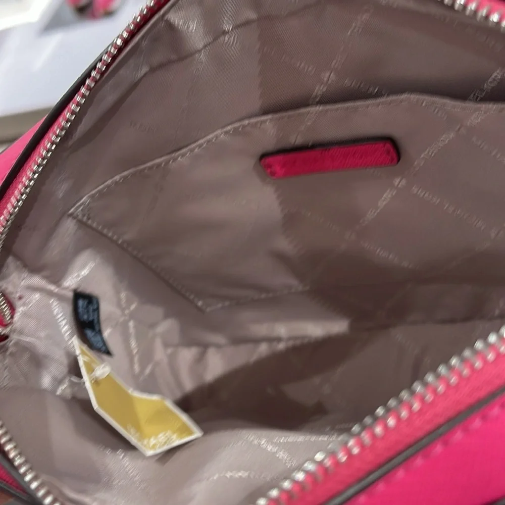 Michael Kors occasion zip featuring