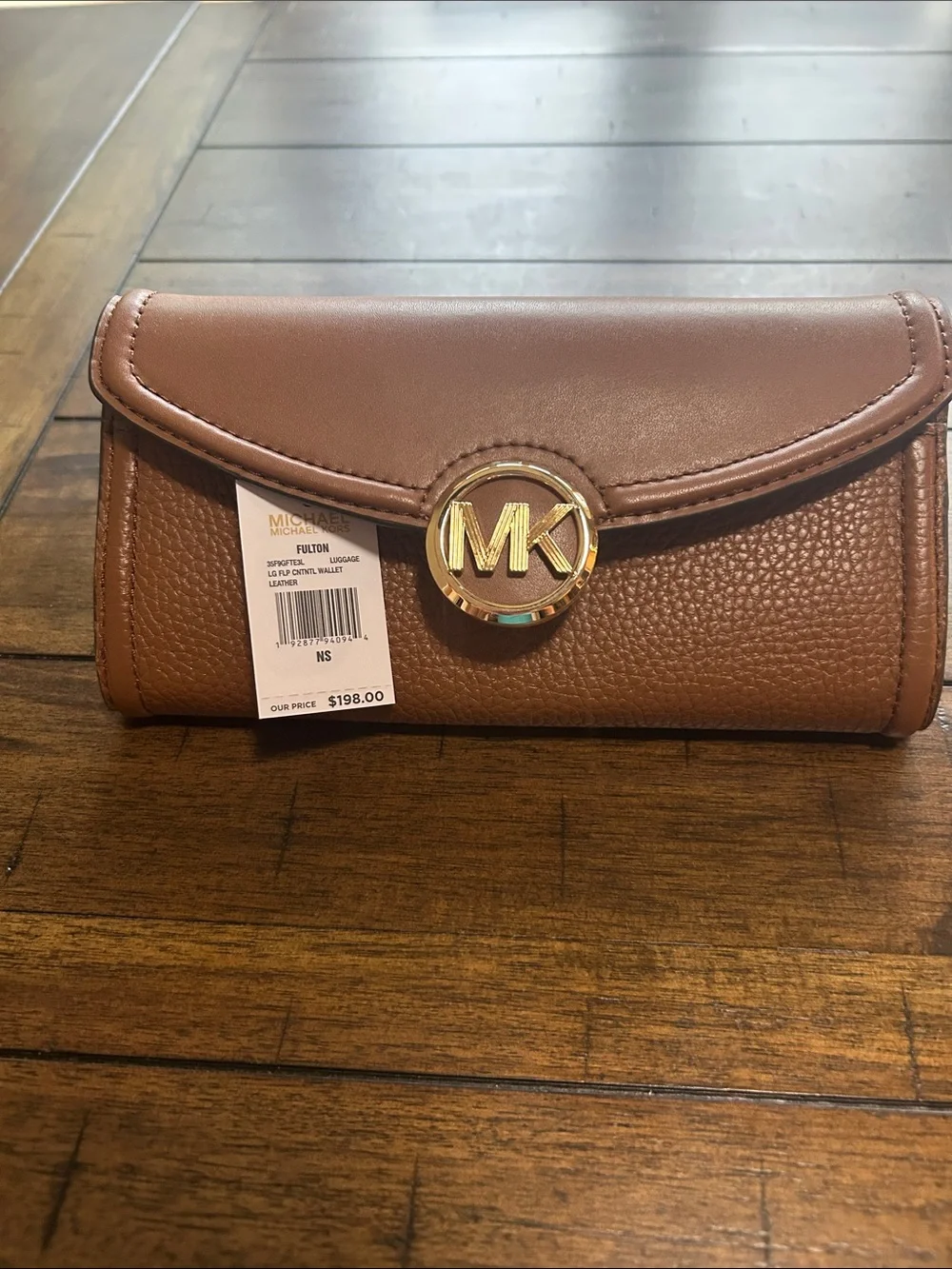 Michael Kors signature mk