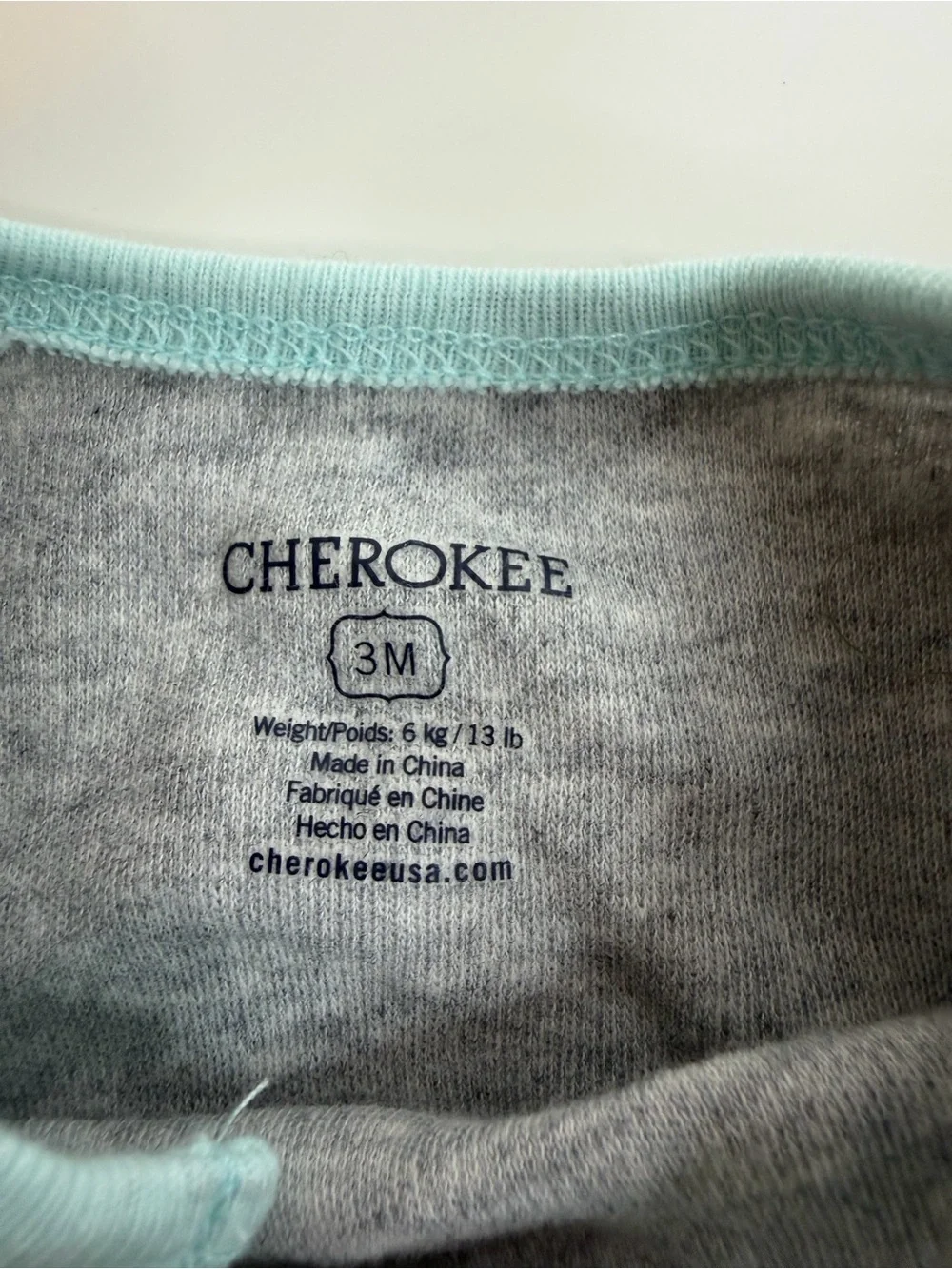 Cherokee Gray Panda Print Footed One-Piece with Mint Trim