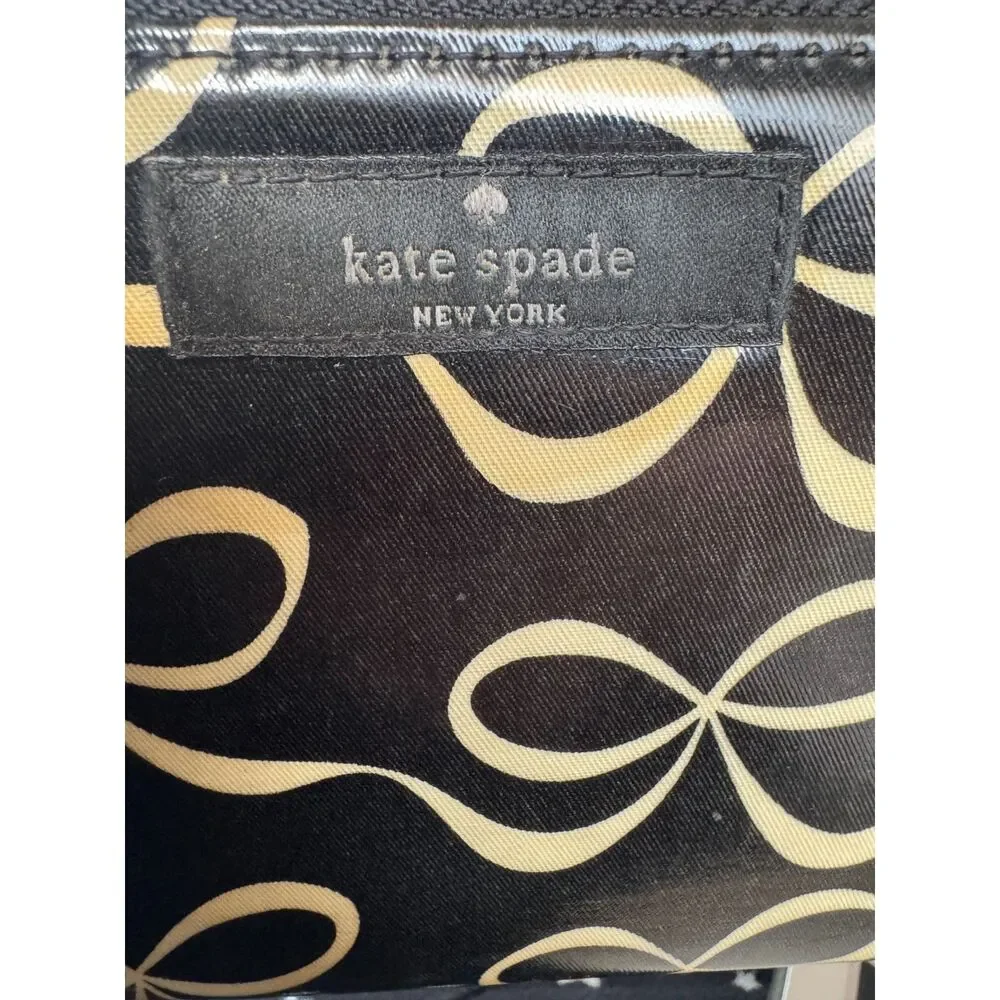 Kate Spade Neda Daycation Zip Around Wallet in Black & Cream Bow Ribbon Pattern