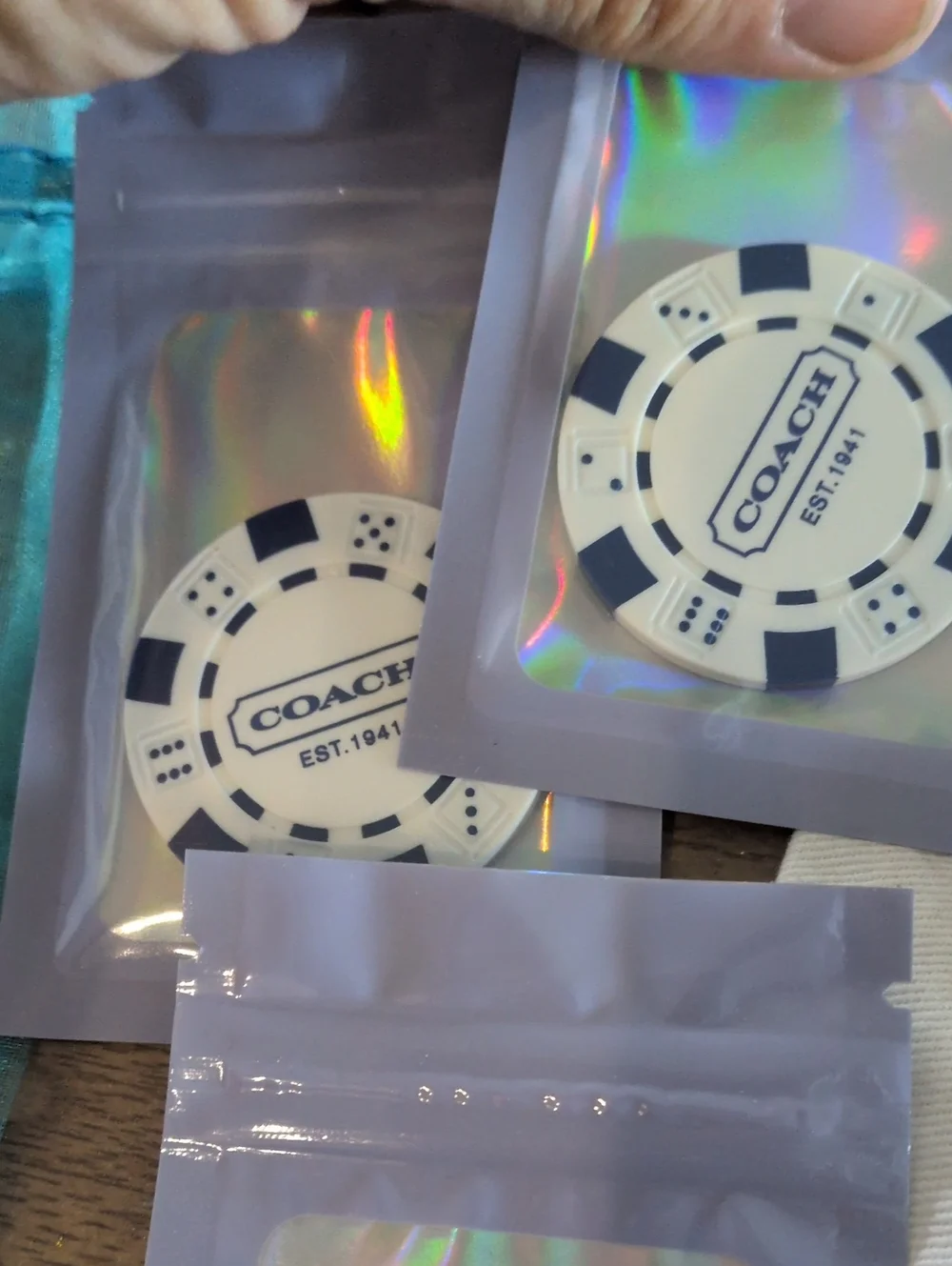 Coach branded poker