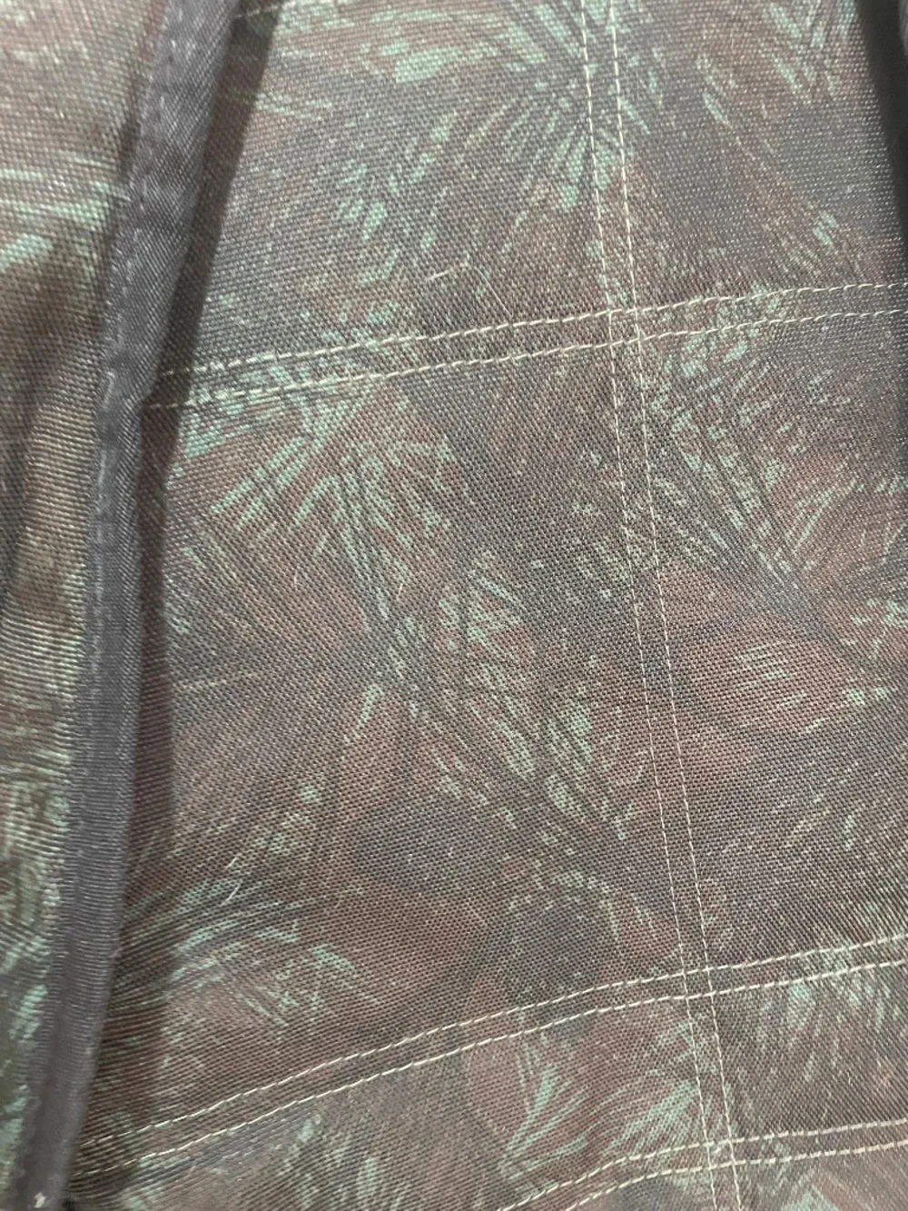 Vans: Nelson backpack in a tropical leave pattern