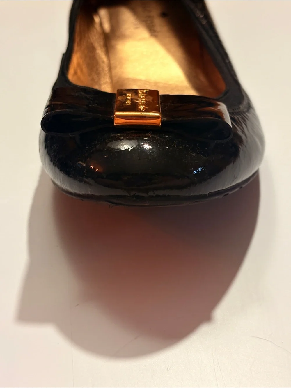 kate spade Black Patent Leather Bow Flats with Gold Plaque