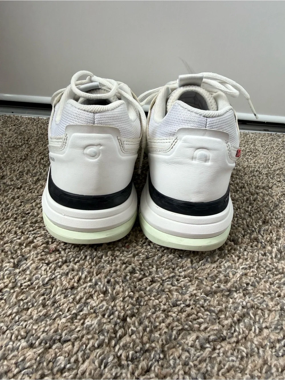On Running Men's White Sneakers with Pale Green Accents