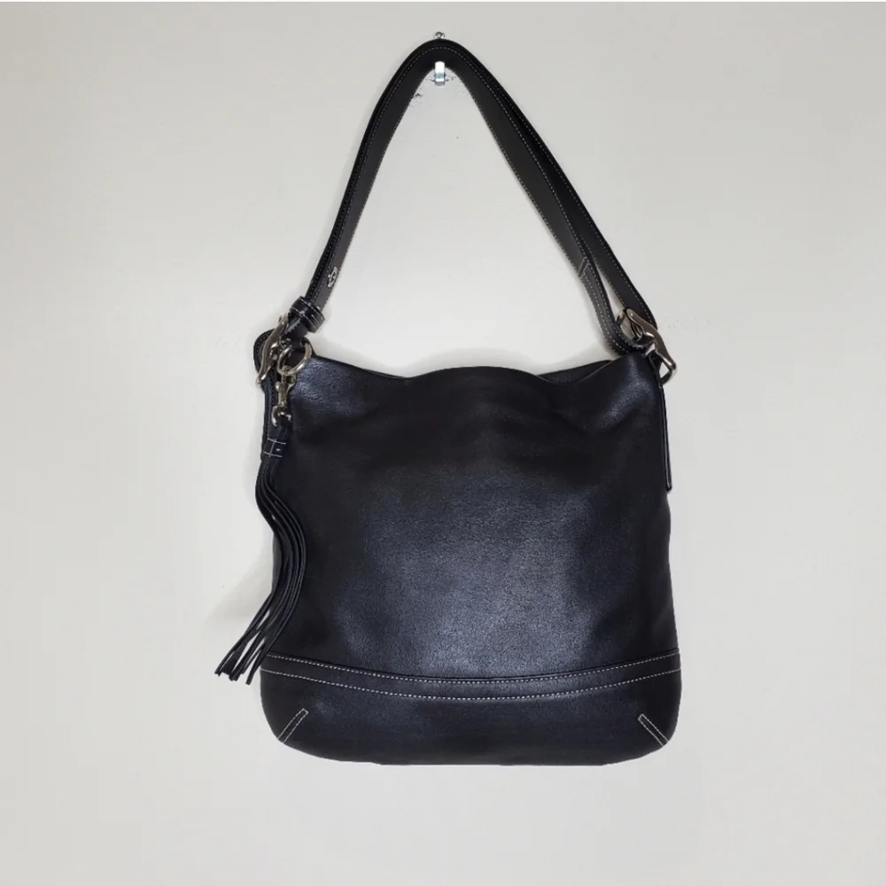 Coach excellent only