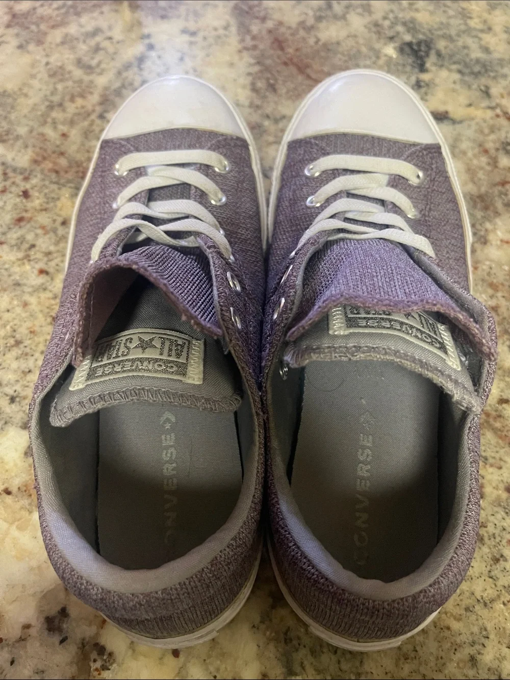 Converse Low-Top Canvas Sneakers in Dusty Plum with White Trim.