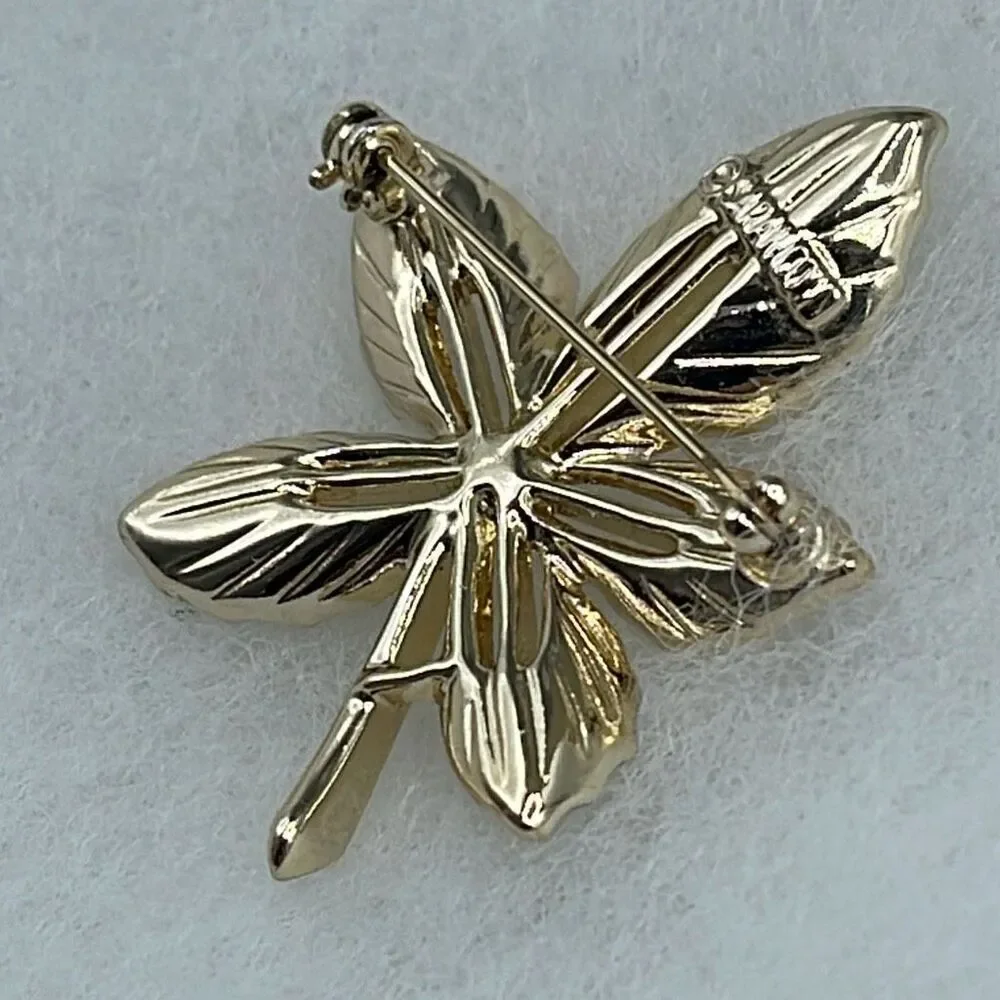 Vintage Sarah Coventry gold colored leaf brooch