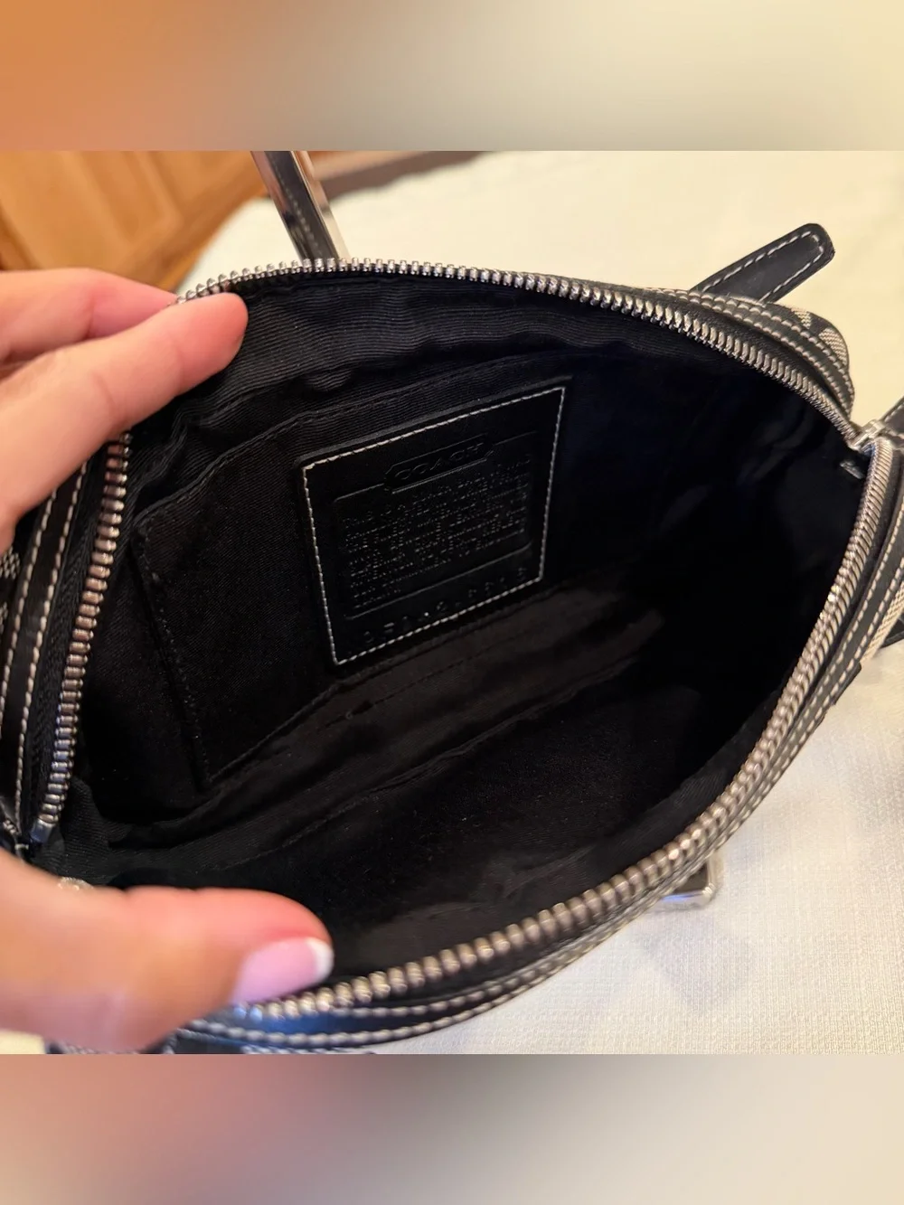 Coach sleek black