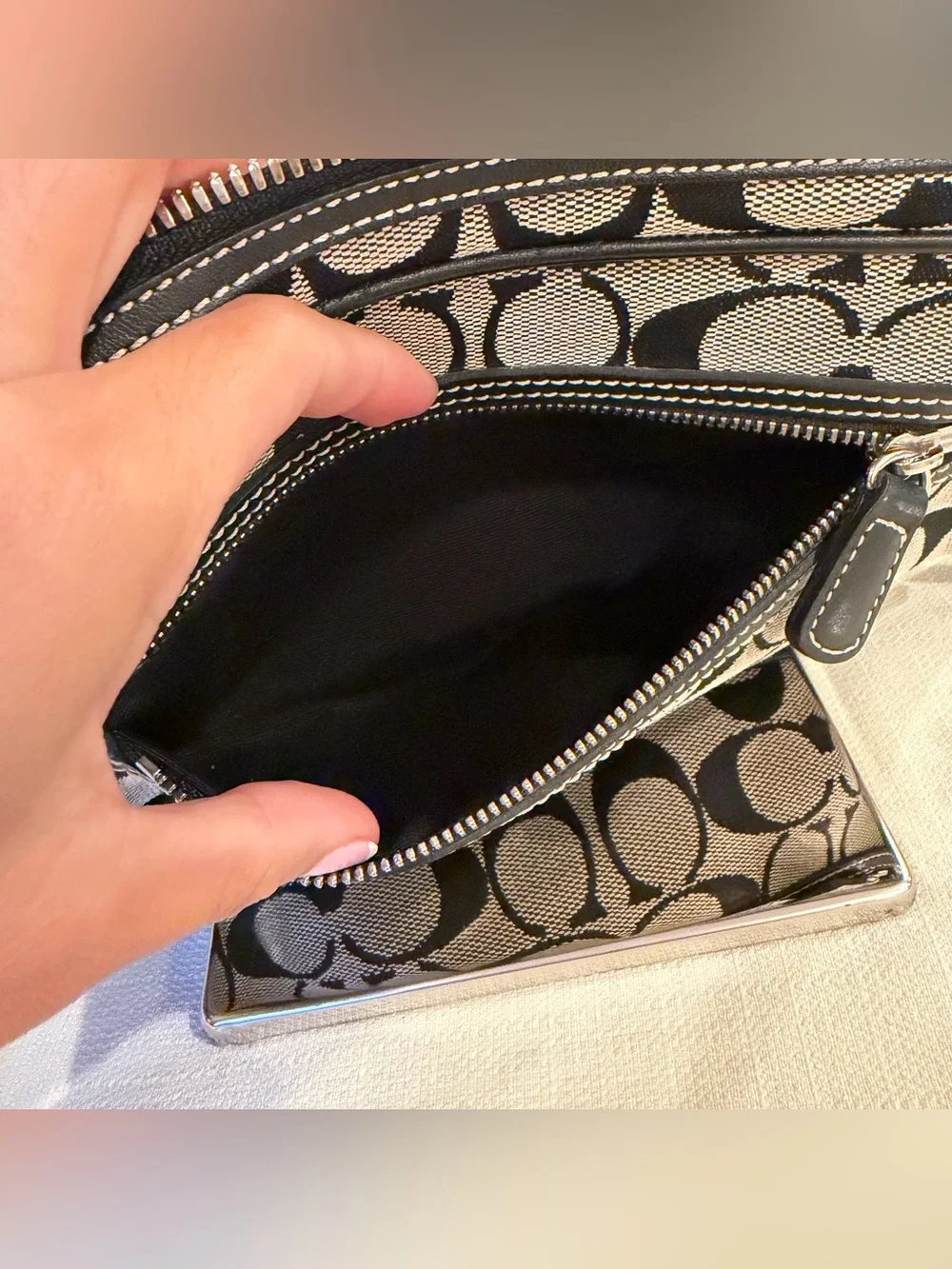 Coach sleek black