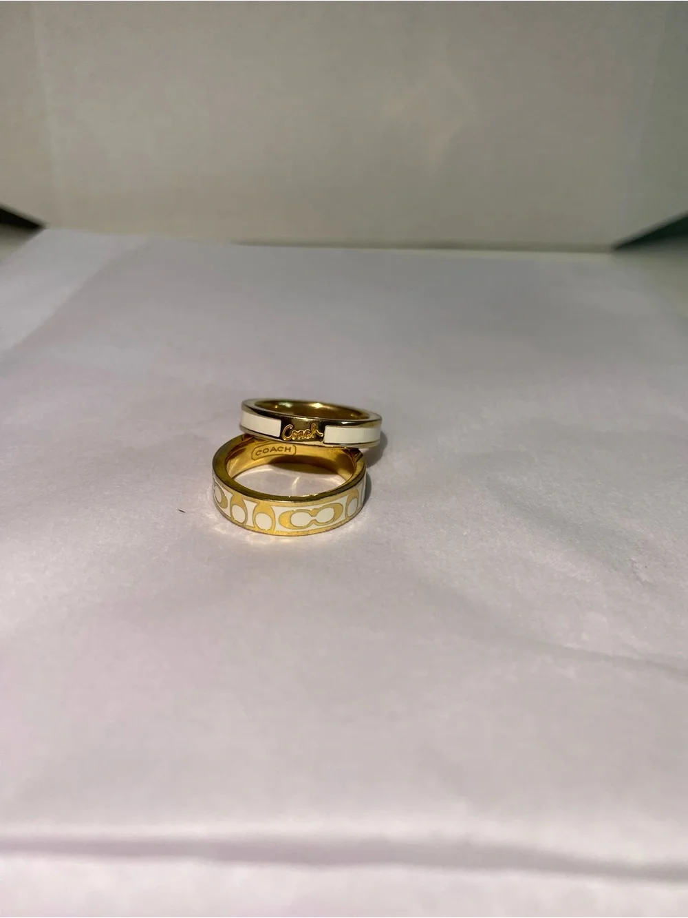 Coach polished gold