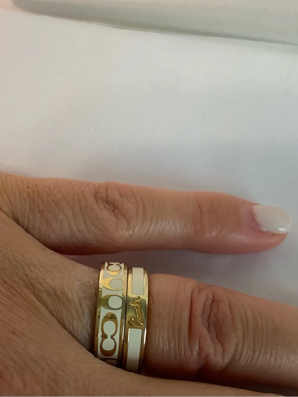 Coach polished gold