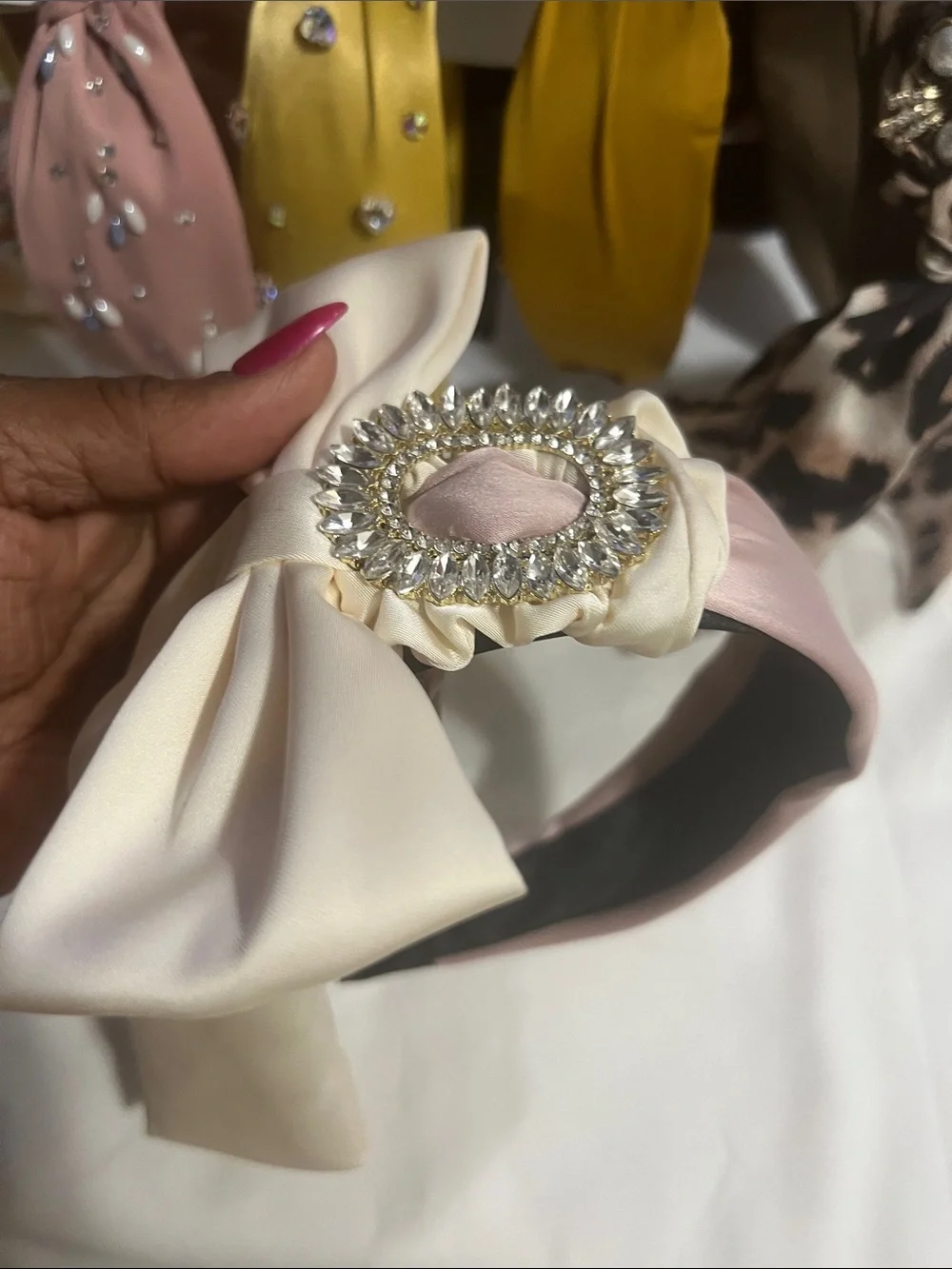 Elegant Pink Satin Headband with Crystal Brooch Accent