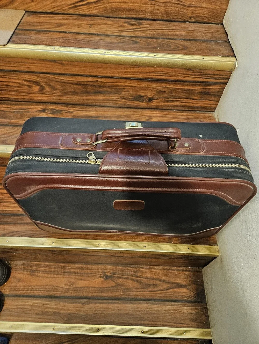 Sears goode blacksuitcase