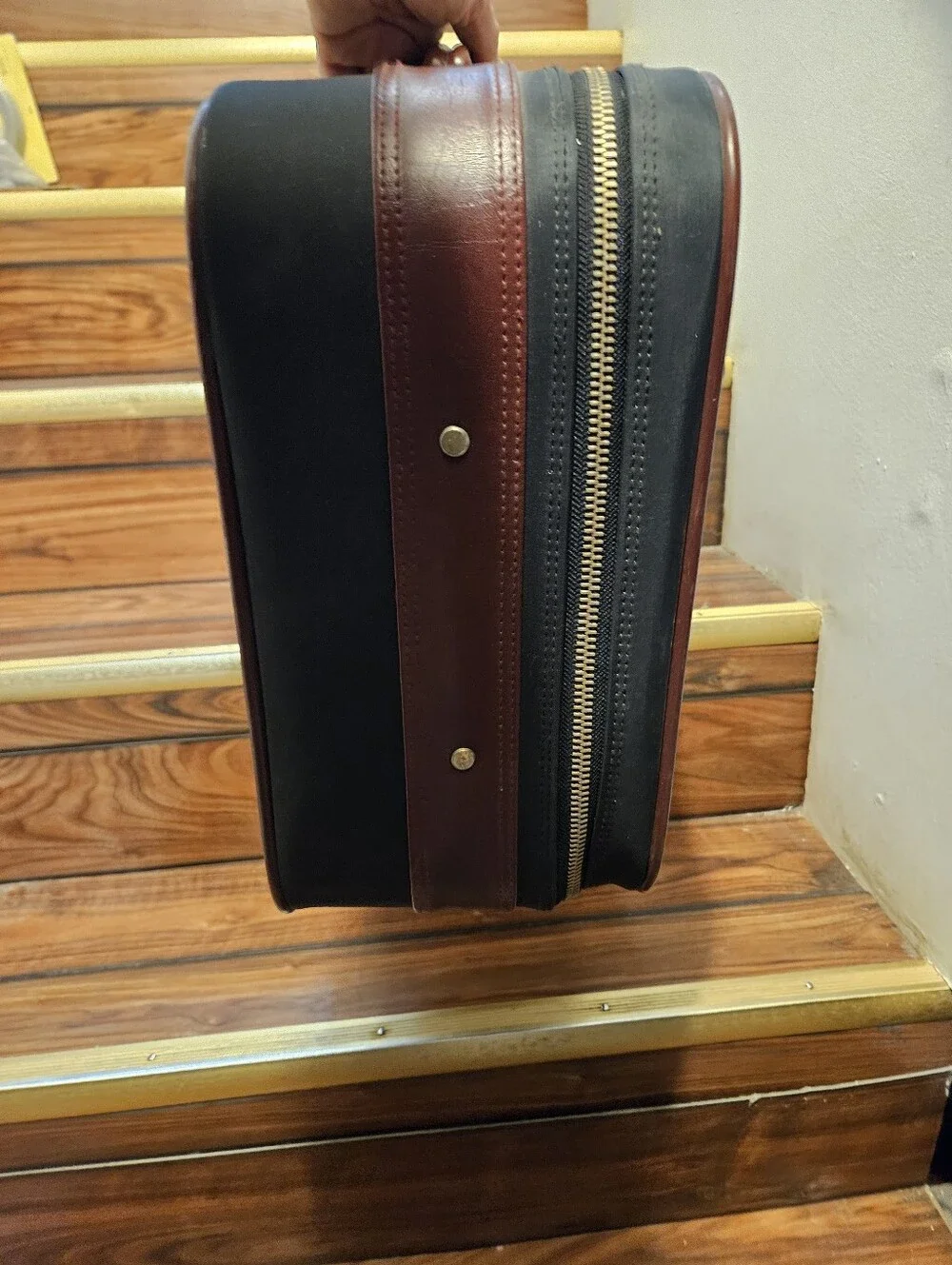 Sears goode blacksuitcase