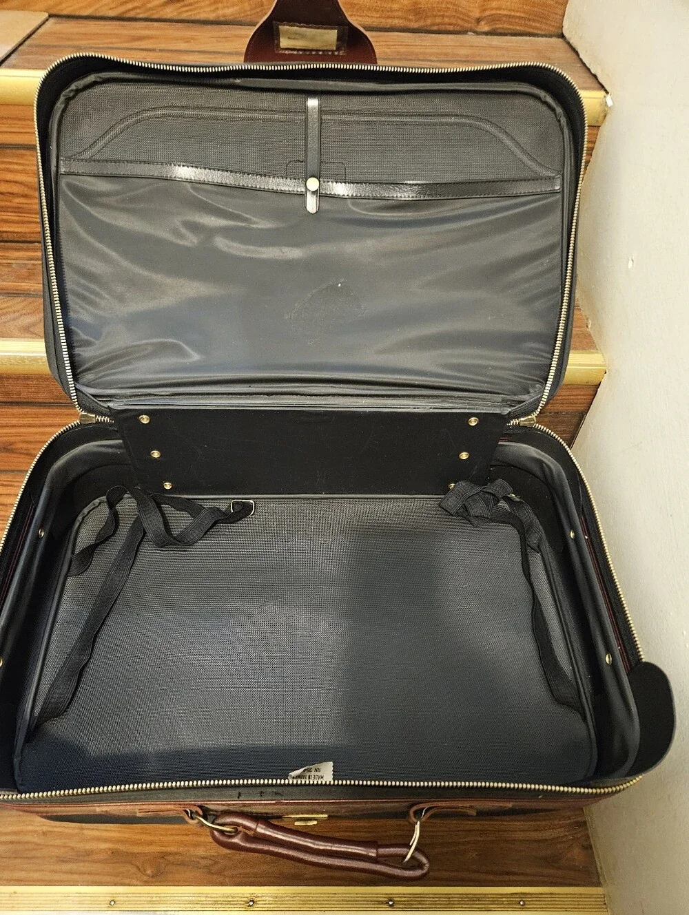 Sears goode blacksuitcase