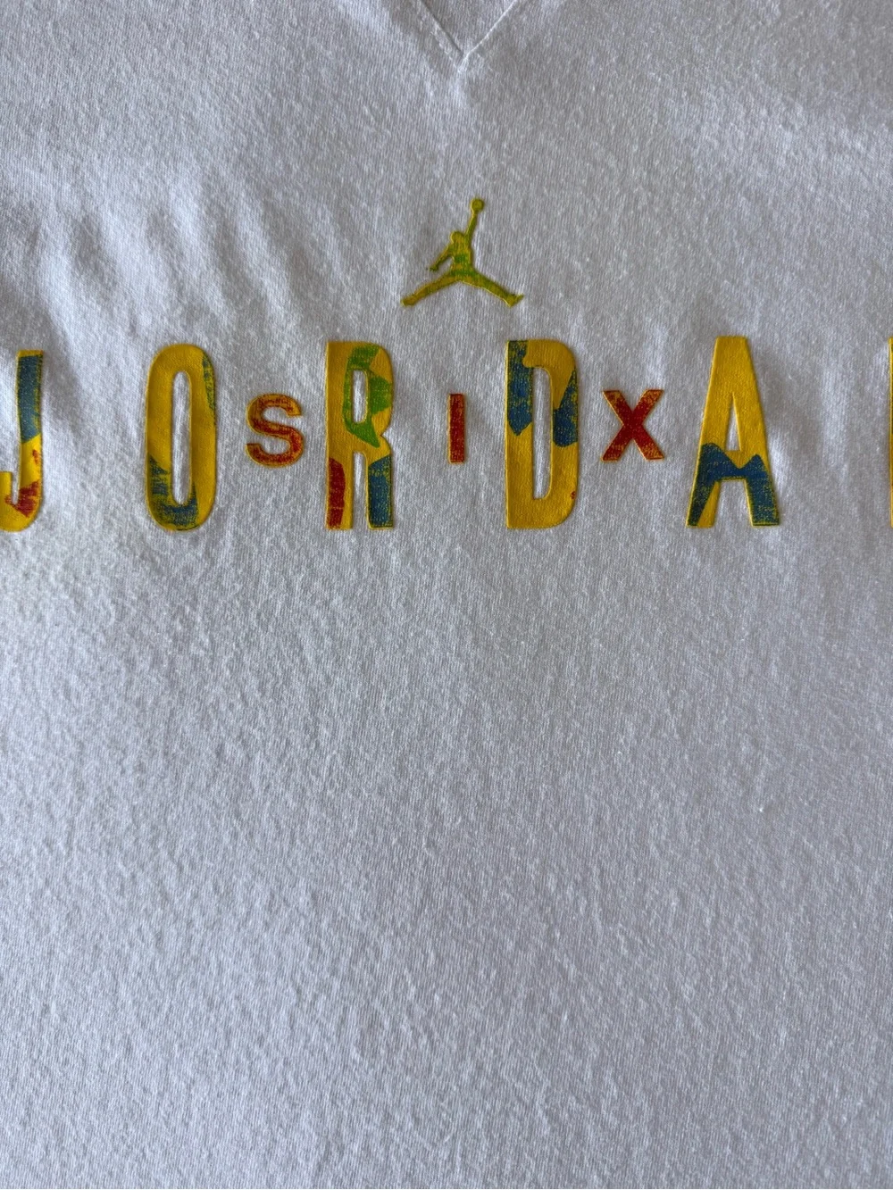 Vintage Jordan White Tee with Multicolor Lettering and Gold Jumpman
