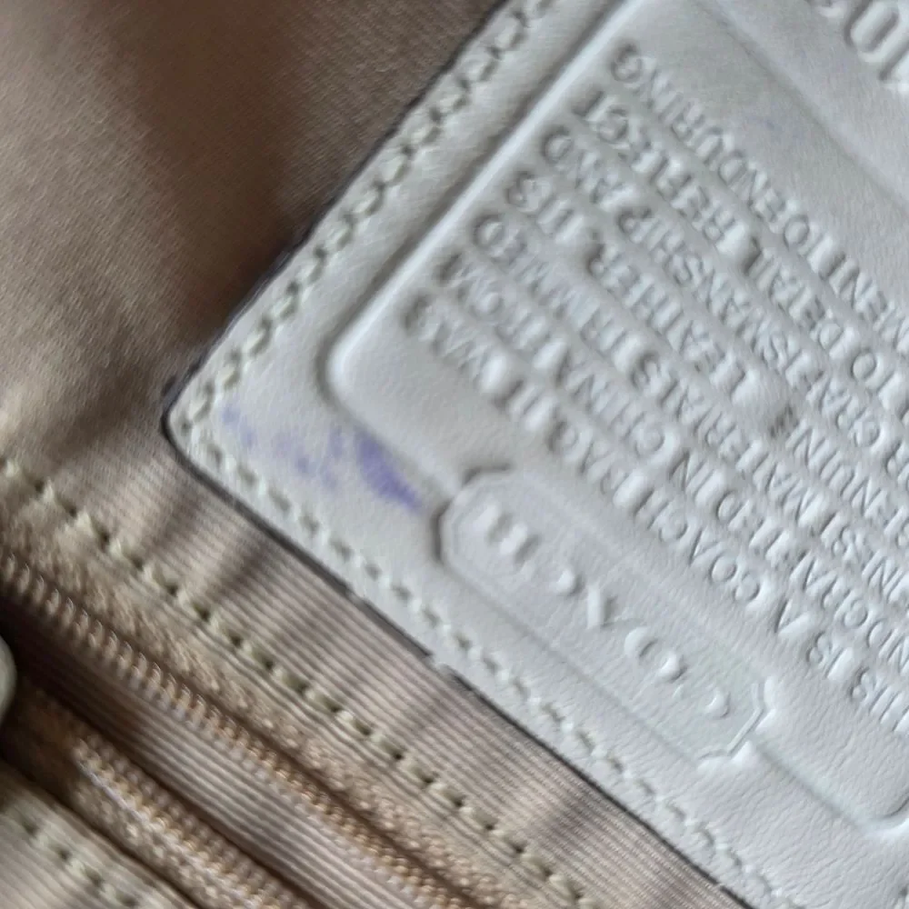 Coach nuetral cream