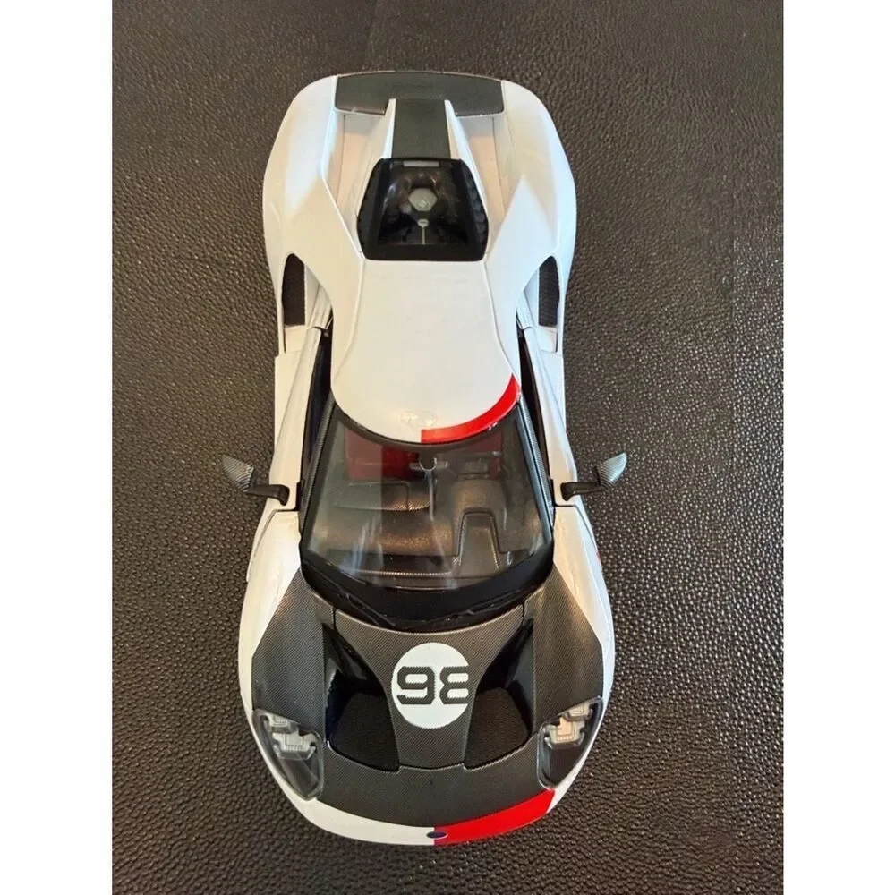 Ford GT # 98 White Heritage Edition Toy Car in White, Black, Red & Gold Maisto