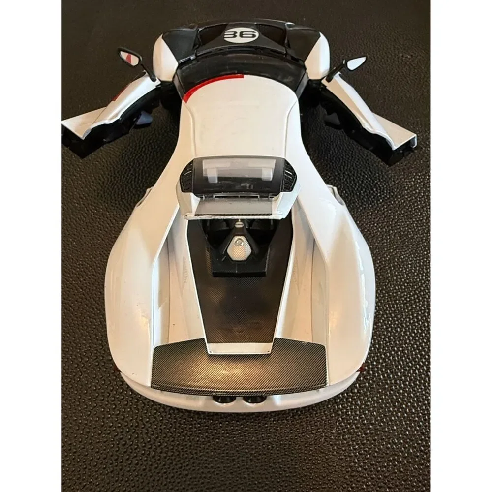 Ford GT # 98 White Heritage Edition Toy Car in White, Black, Red & Gold Maisto