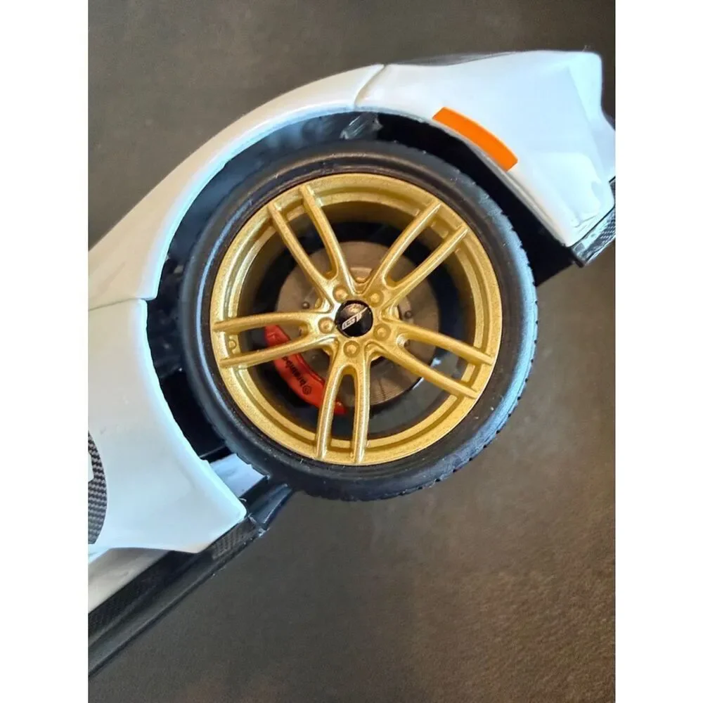 Ford GT # 98 White Heritage Edition Toy Car in White, Black, Red & Gold Maisto