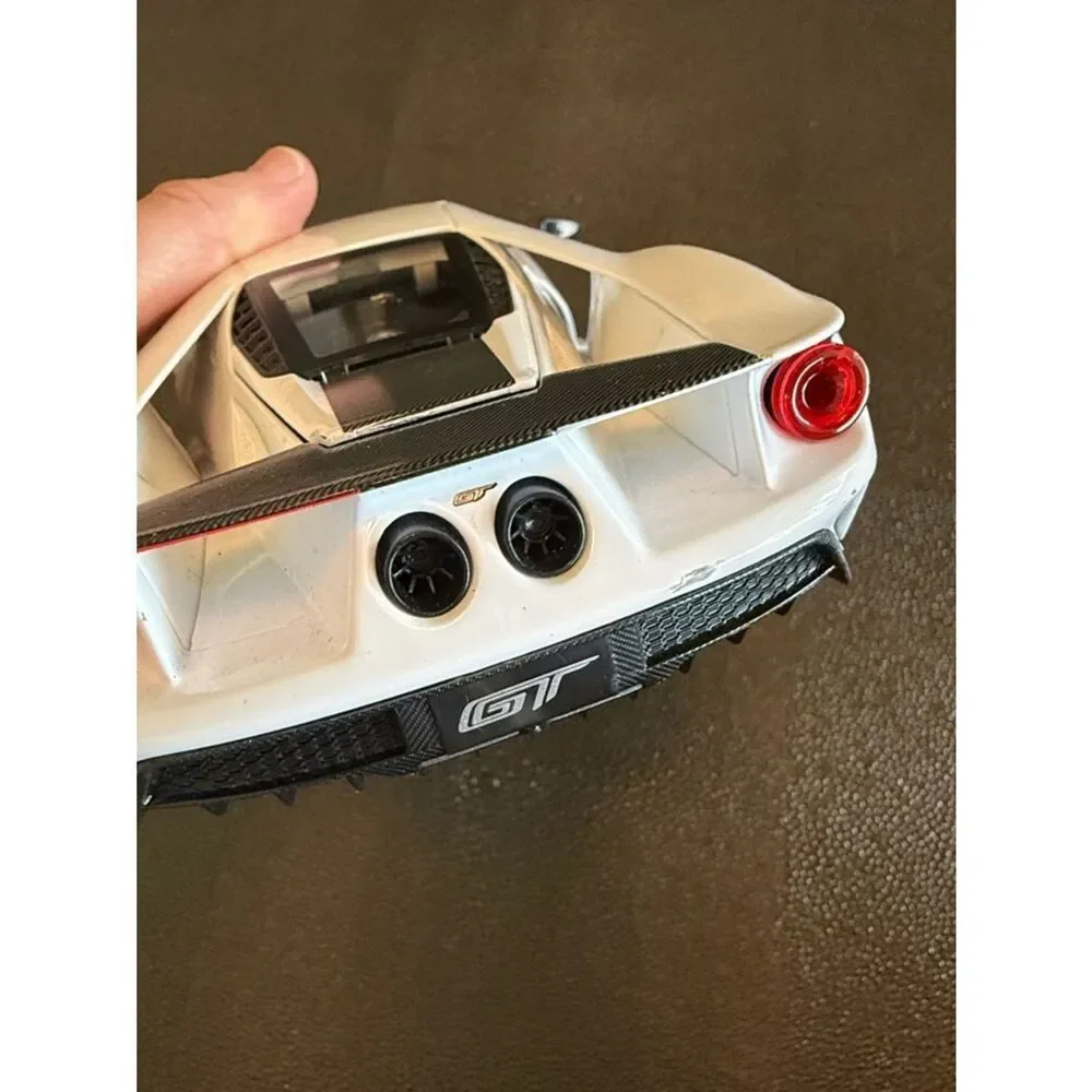 Ford GT # 98 White Heritage Edition Toy Car in White, Black, Red & Gold Maisto