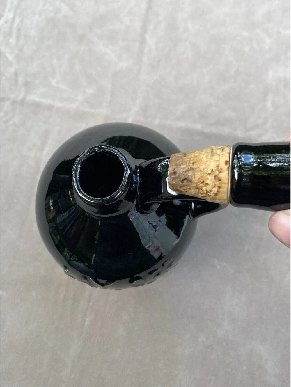 Black Ceramic Jug, says “Lay Off.. This Is The Old Mans Private Stuff” with Cork