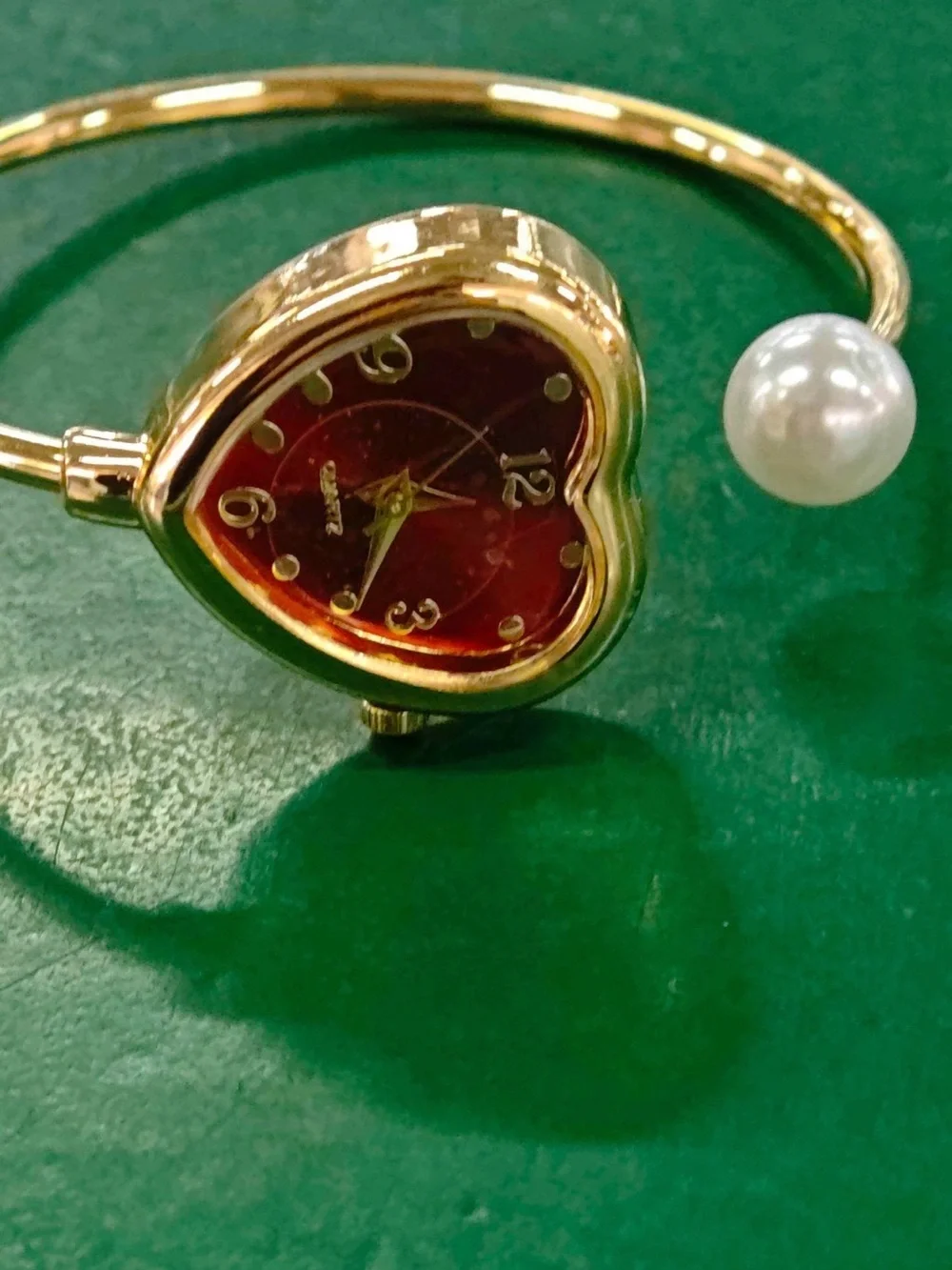 Gold Heart Bangle Watch with Red Dial and Pearl Accent