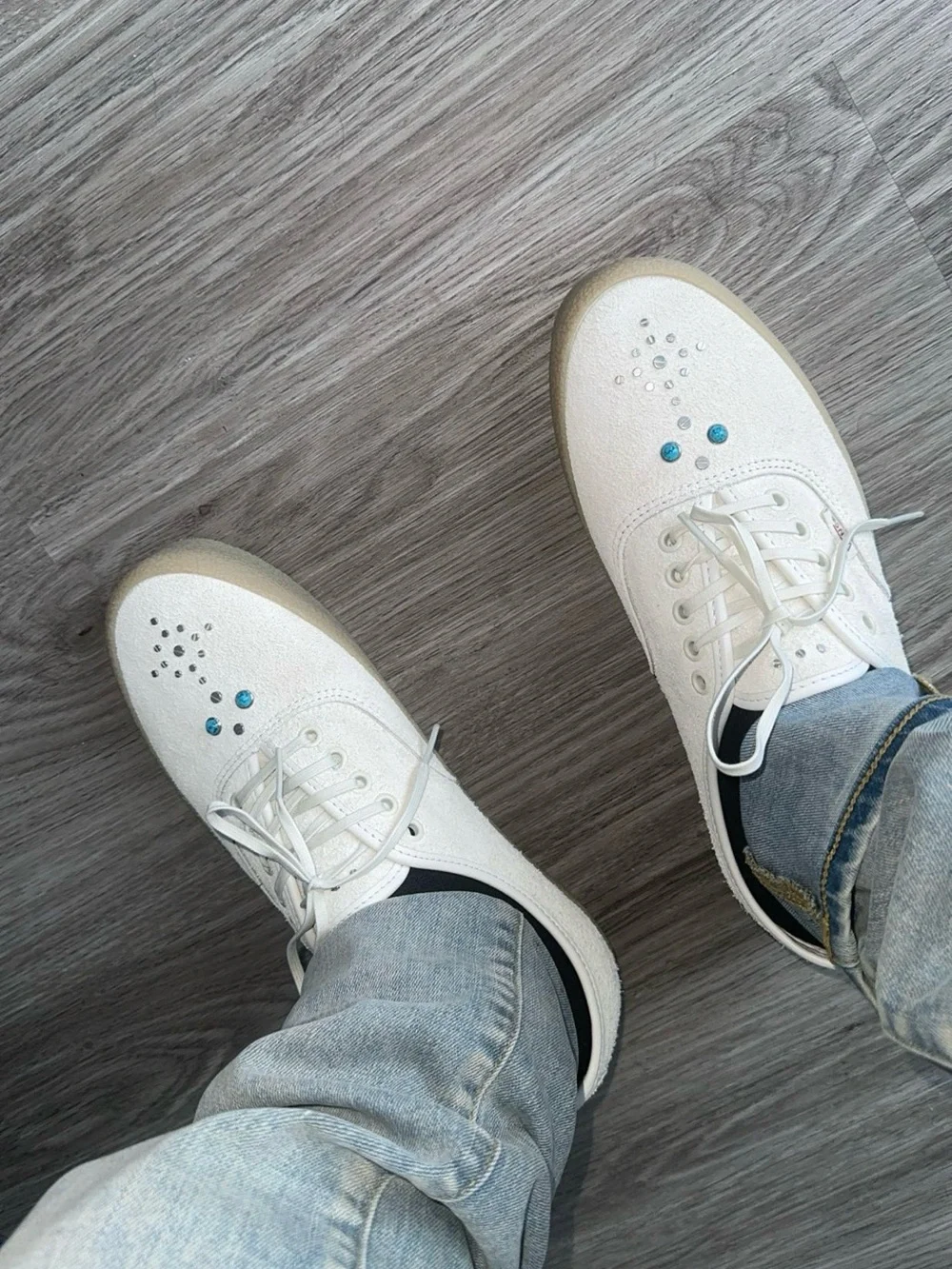 Vans White Sneakers with Blue Stud Accents