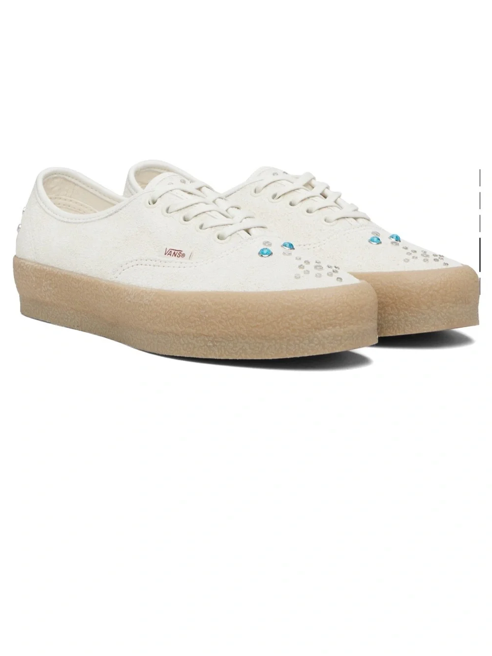 Vans White Sneakers with Blue Stud Accents