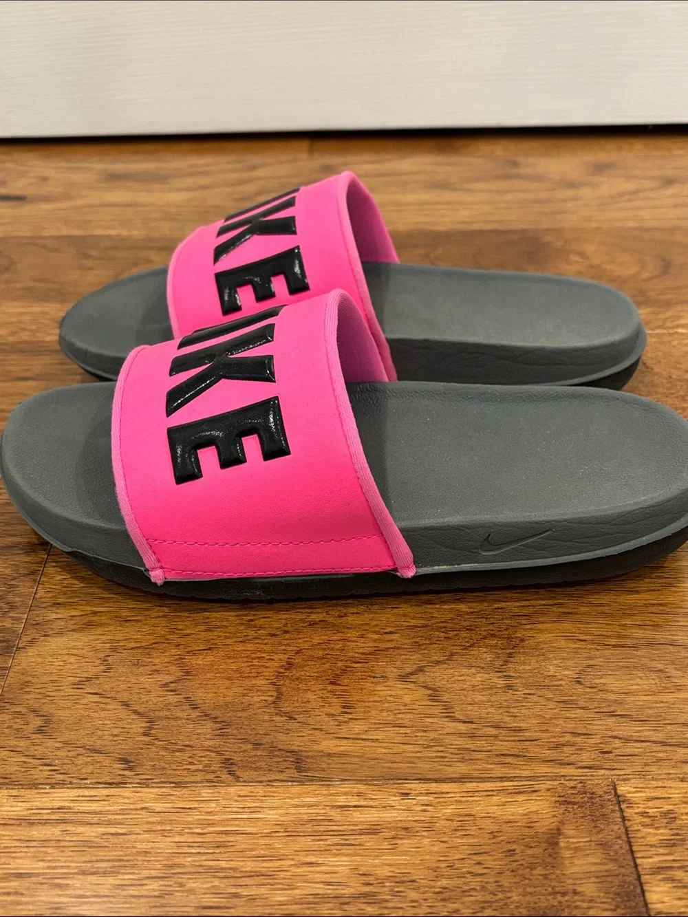 Nike Women’s Pink and Gray Slide Sandals with Bold Logo