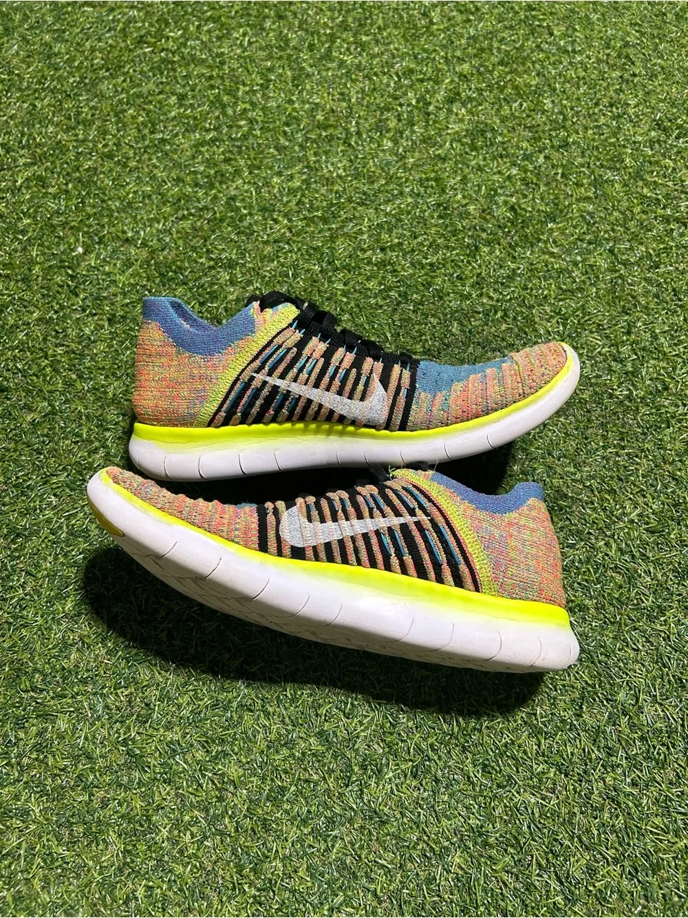 Nike Flyknit Free Run Sneakers