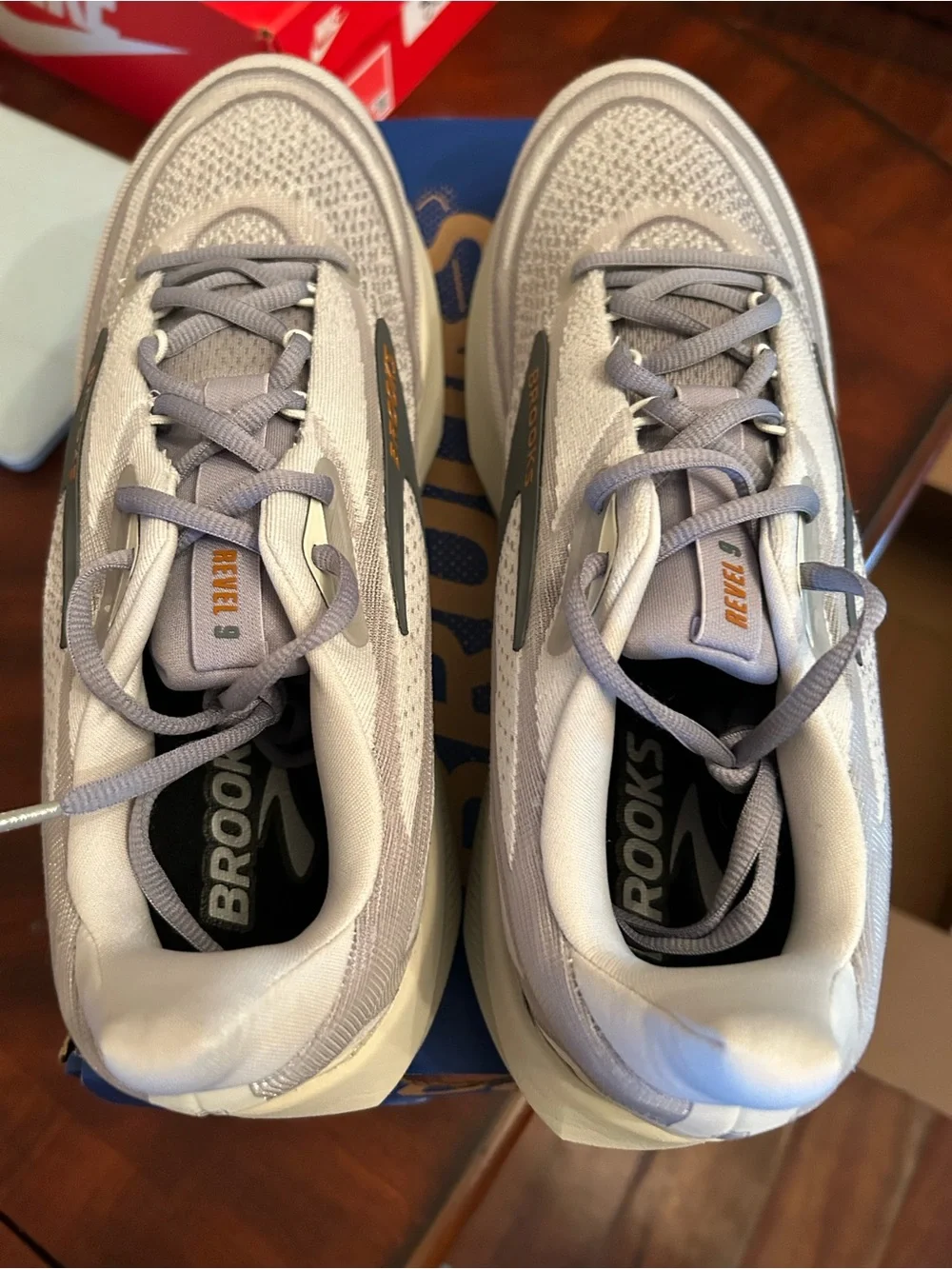 Men’s Brooks light gray and blue knit running shoes with gum outsole